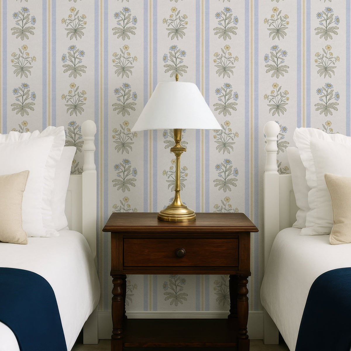 Cottage wallpaper featuring floral and striped designs, with a cozy bedside table and lamps in a serene bedroom setting.