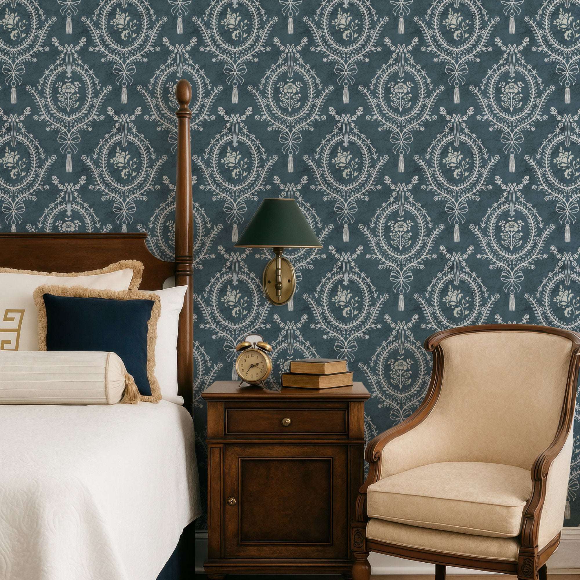 Teal damask-style wallpaper pattern with floral medallions, bows, and tassels.