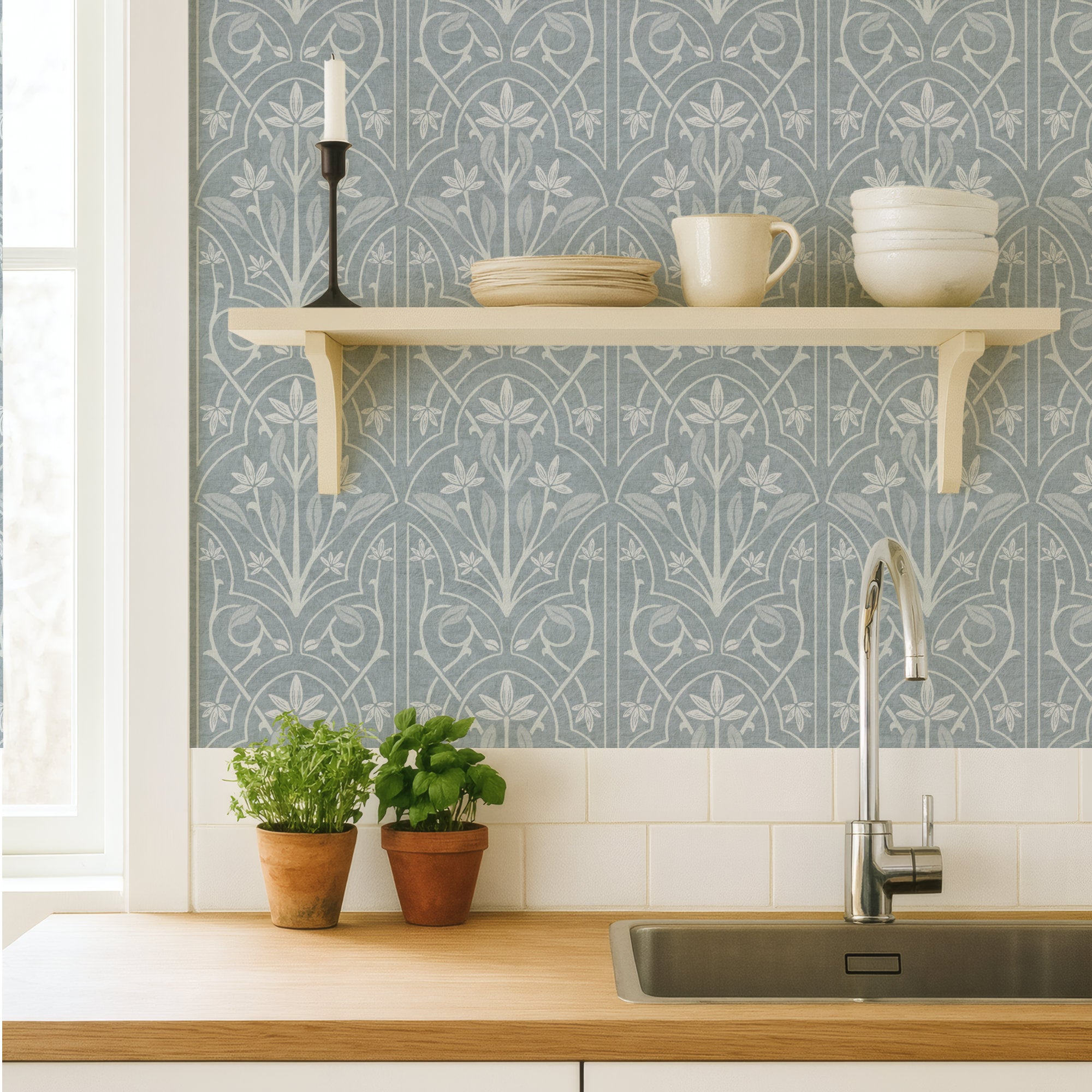 Blue and White Art Nouveau Trellis Wallpaper in a kitchen setting with potted herbs, shelf, and countertop.