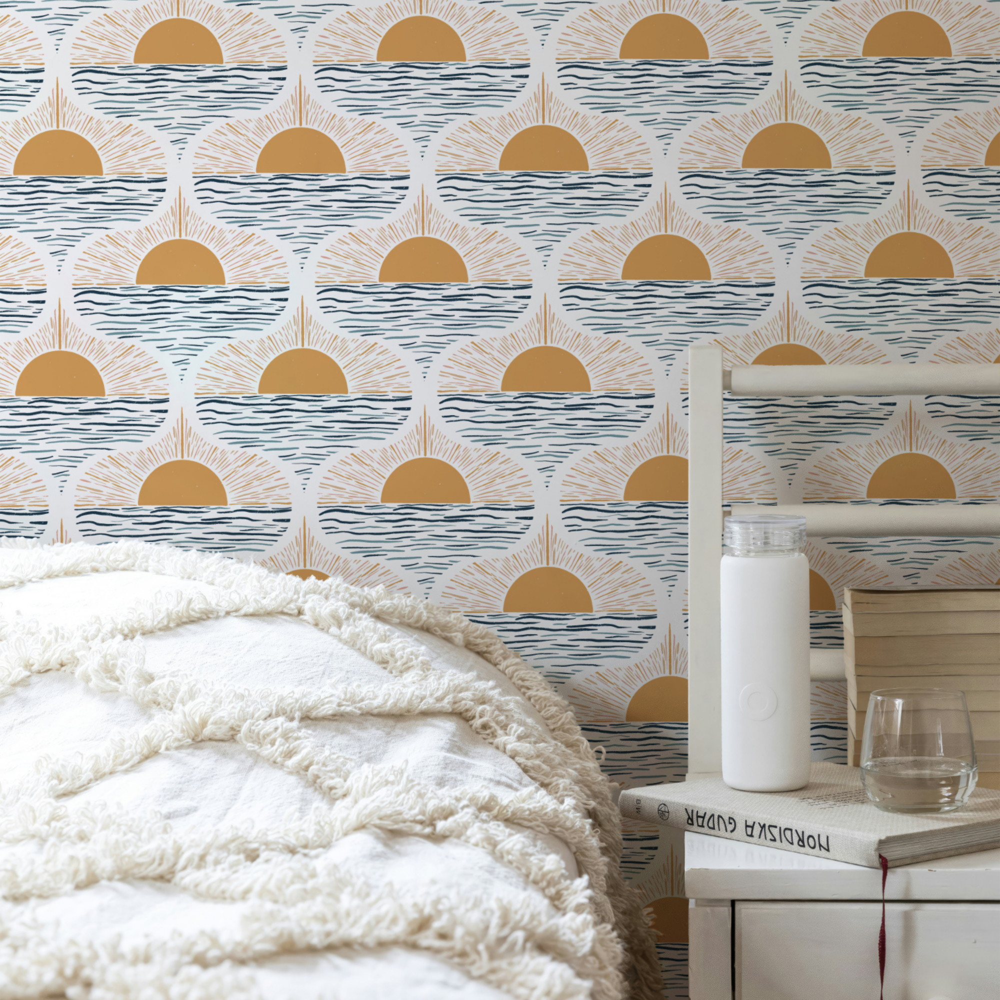 Boho coastal sunrise wallpaper in yellow and blue – modern beach house bedroom feature wall