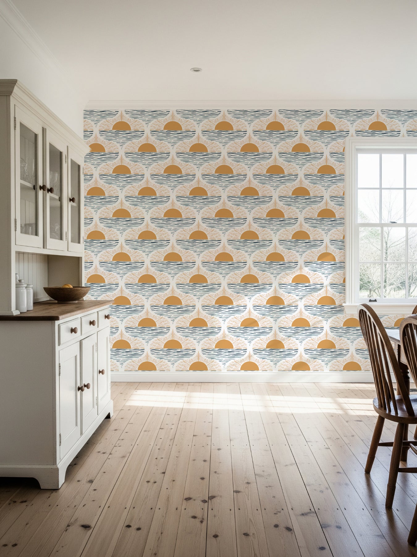Boho coastal wallpaper with sunrise over ocean design in yellow and blue – modern beach house dining room feature wall