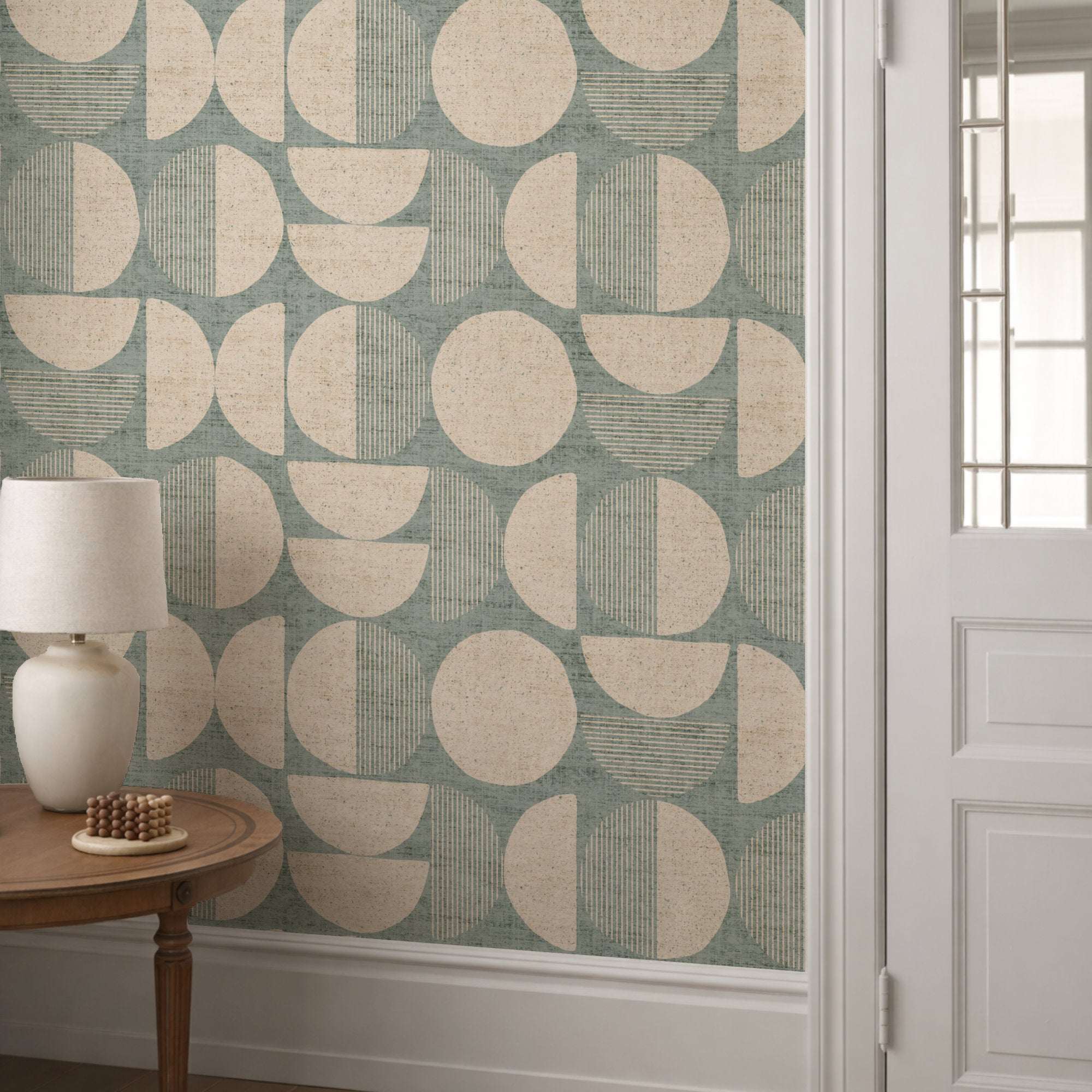 Mid-century circle-pattern wallpaper in teal, green, and beige