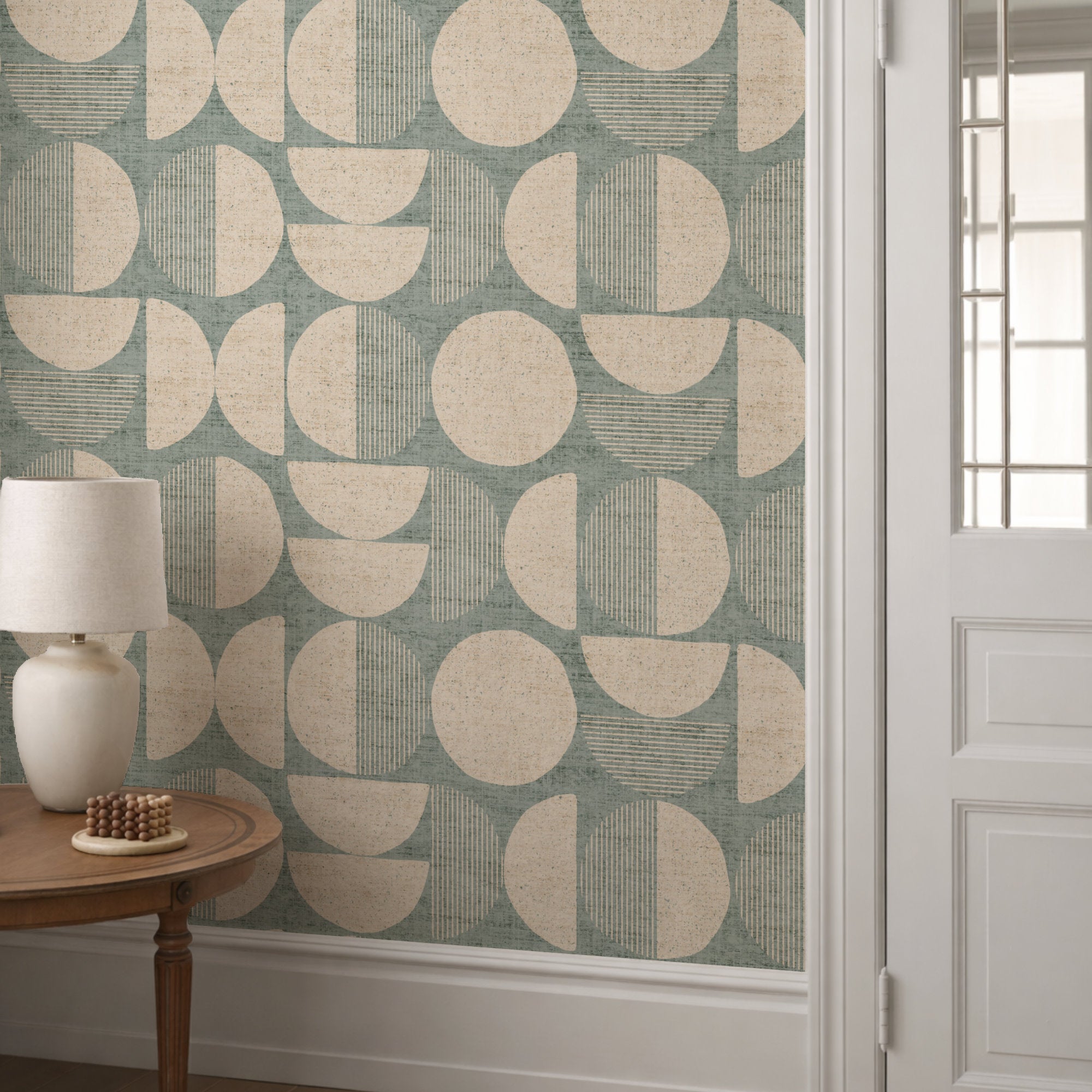 Mid-century circle-pattern wallpaper in teal, green, and beige