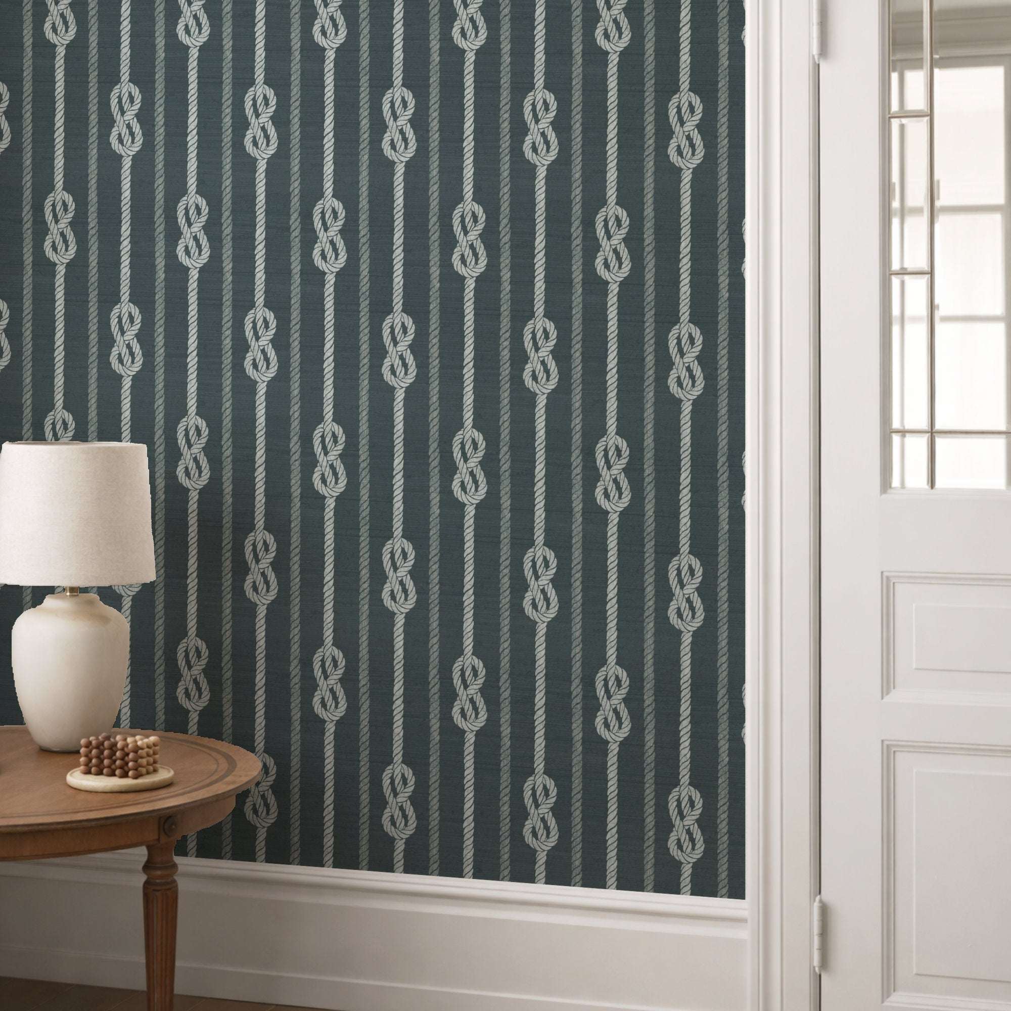 Nautical knot rope stripe wallpaper on dark navy with white rope knot motifs