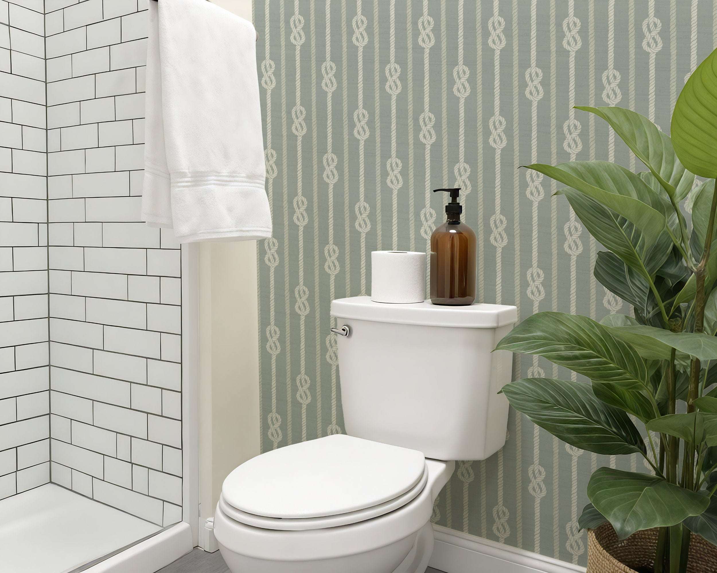 Nautical knot rope stripe wallpaper on light blue wall with white rope knot pattern