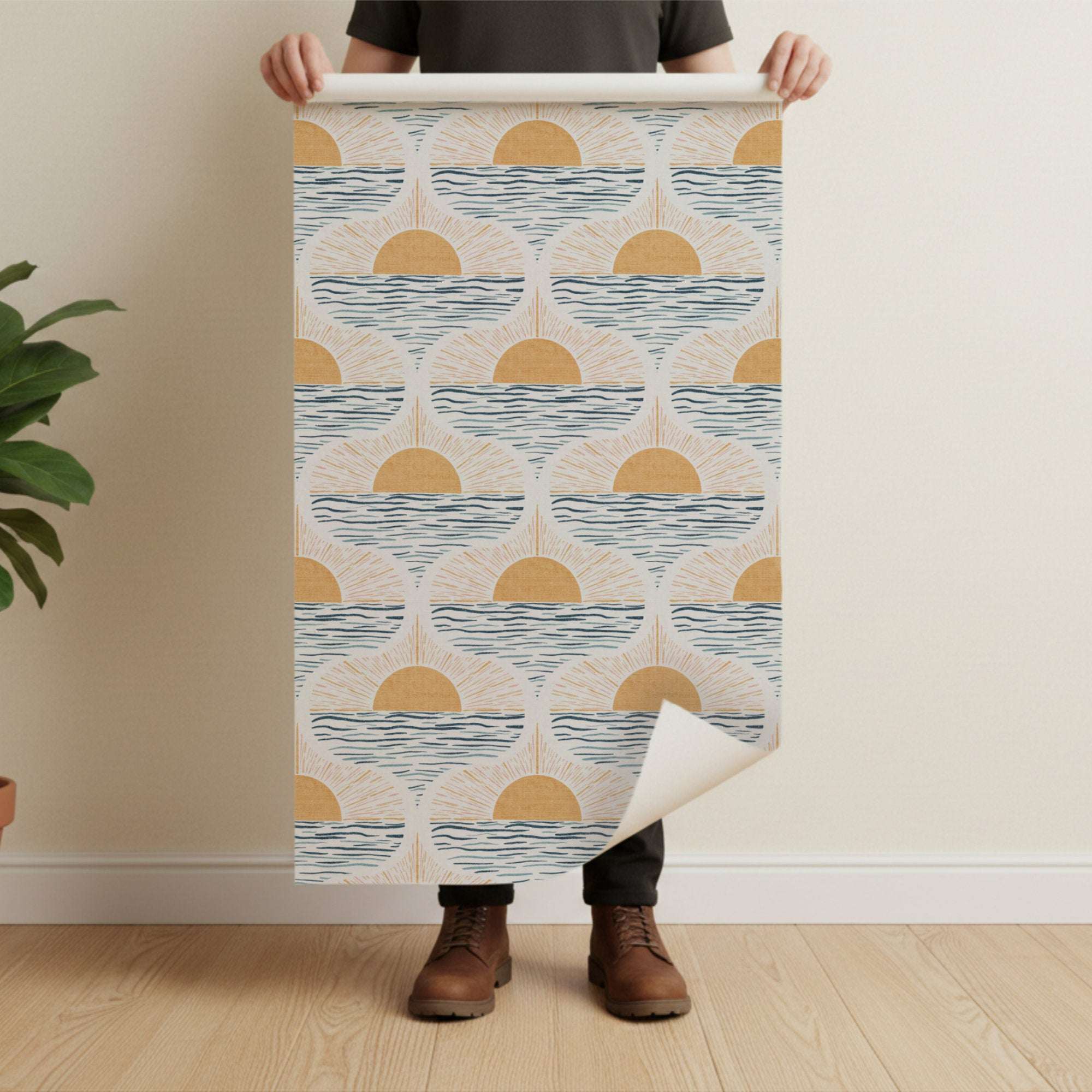 Roll of sun and sea wallpaper with cream background, blue waves, and golden sun circles