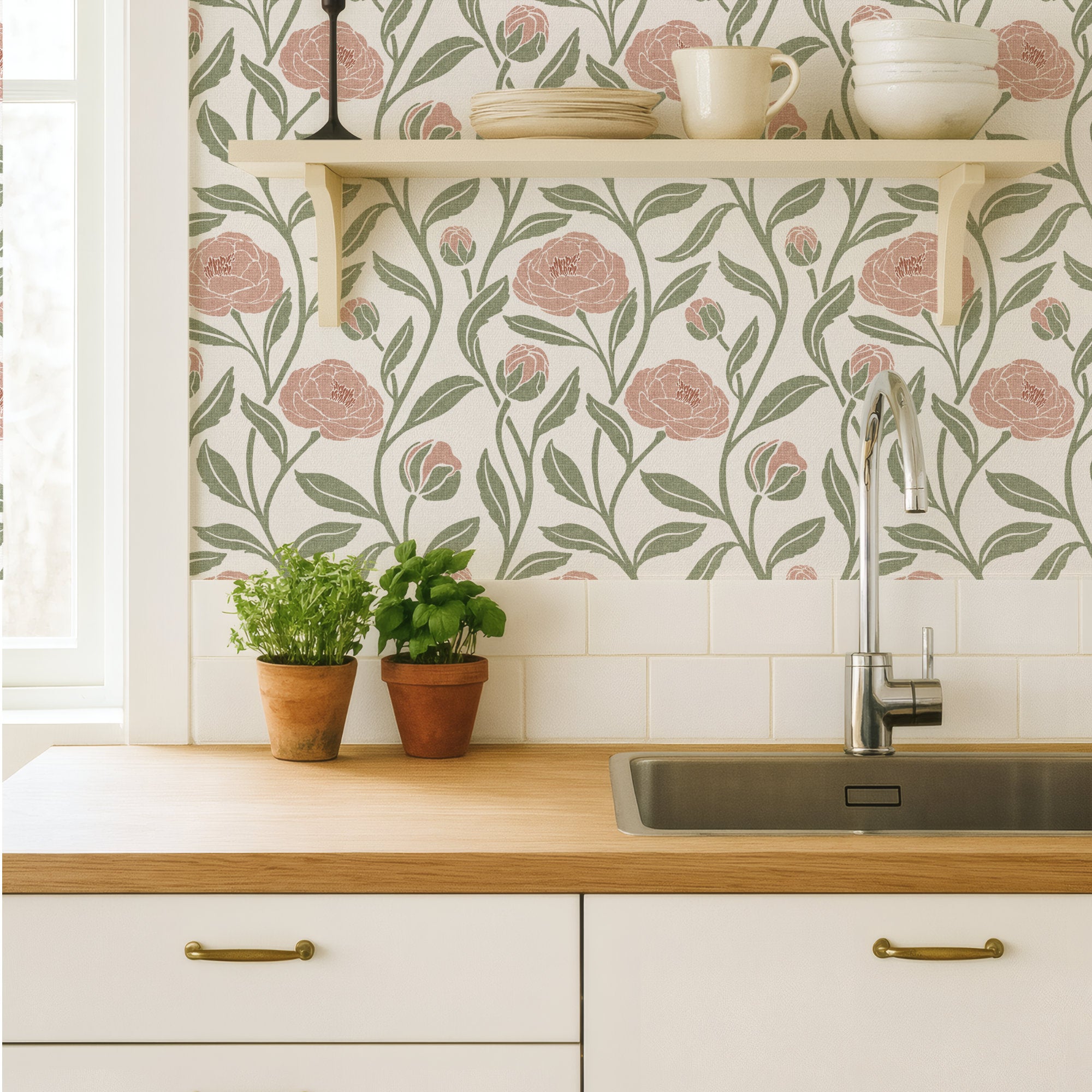 Blush pink peony flower wallpaper in a kitchen, trailing peonies above a worktop