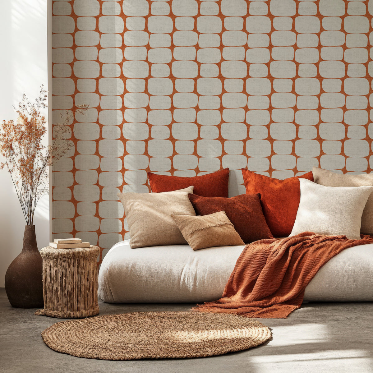 Retro geometric wallpaper in Terracotta, styled in a modern boho living room with neutral decor.