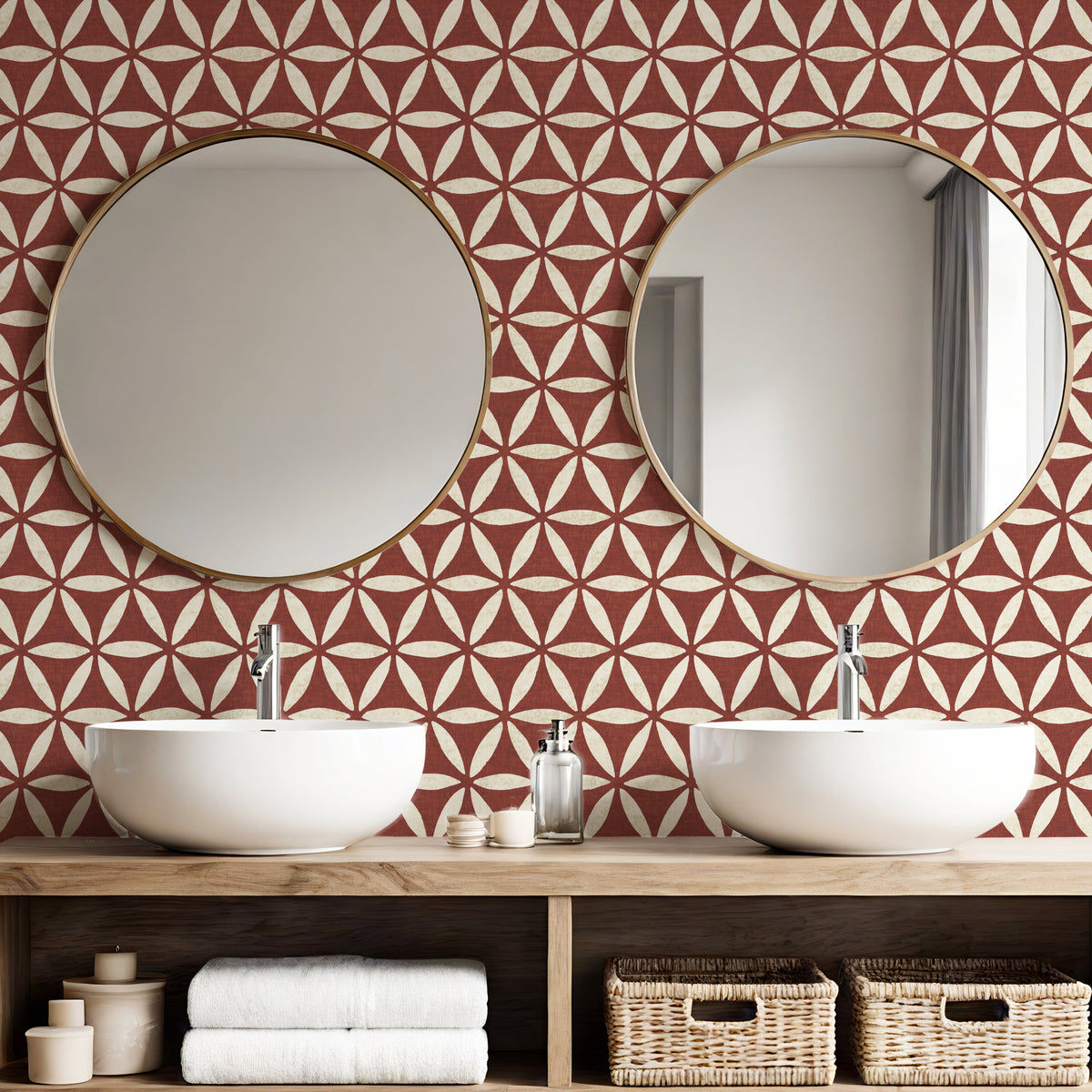 Terracotta geometric wallpaper in bathroom with double basins and round gold mirrors