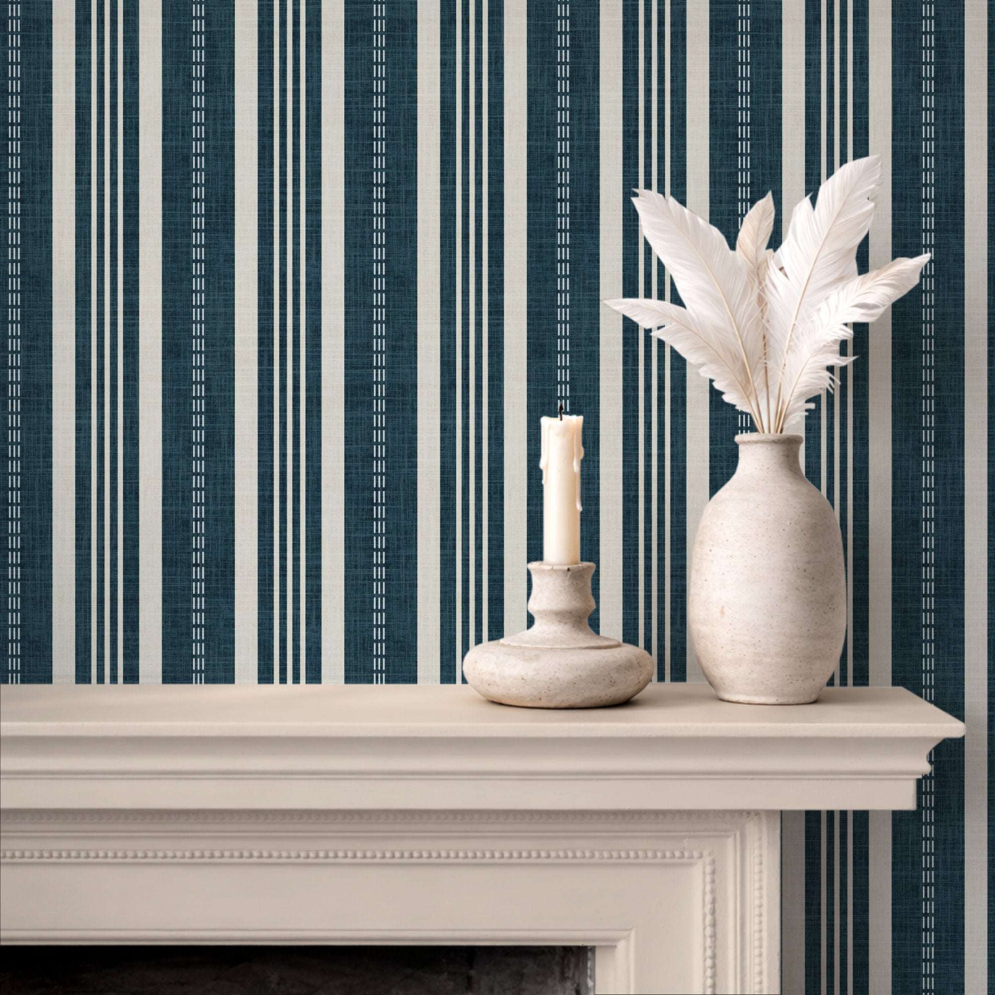 Vertical ticking stripe wallpaper pattern in deep blue, cream, and thin white dotted stripes