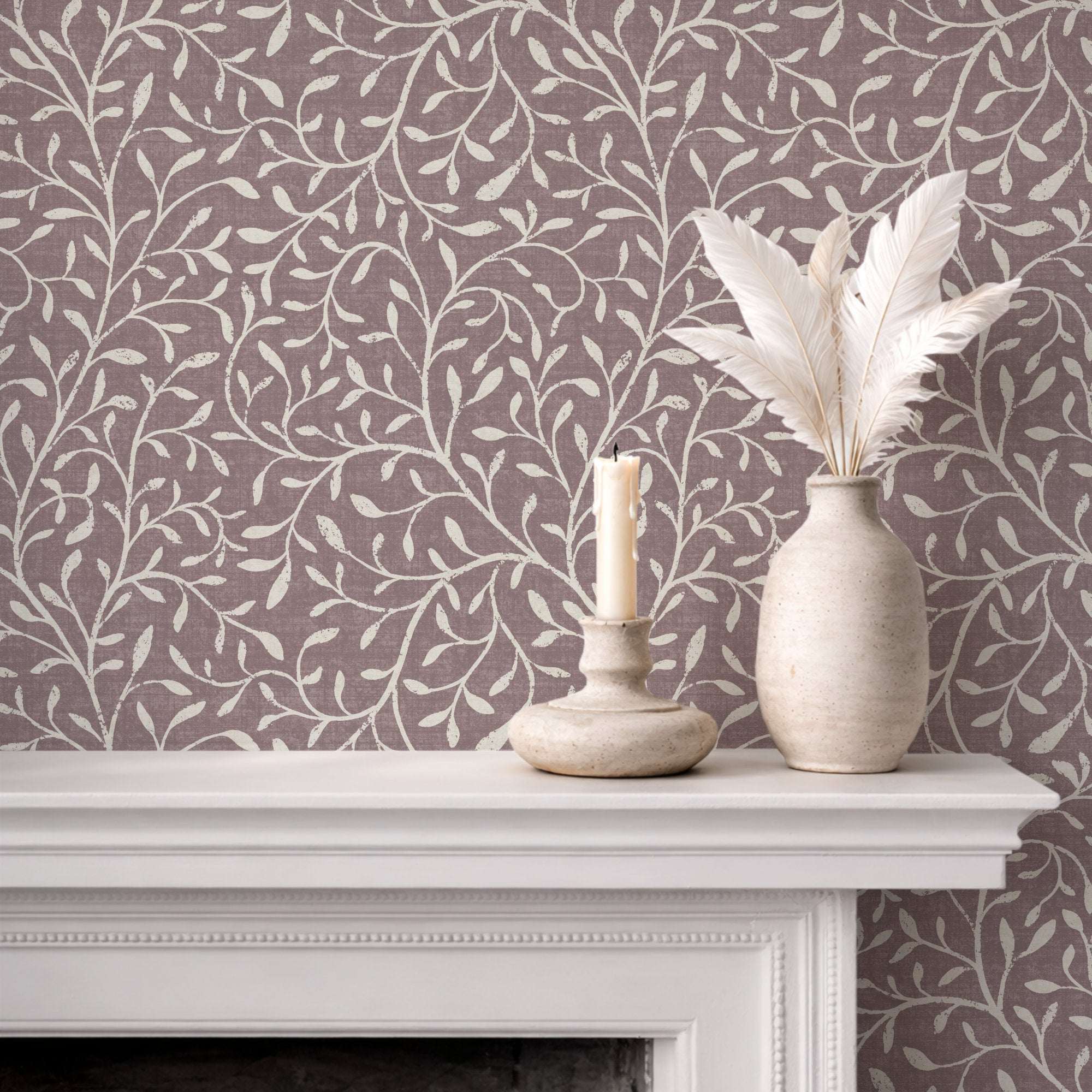 Botanical leaf silhouette wallpaper with white vine pattern on mauve-purple background
