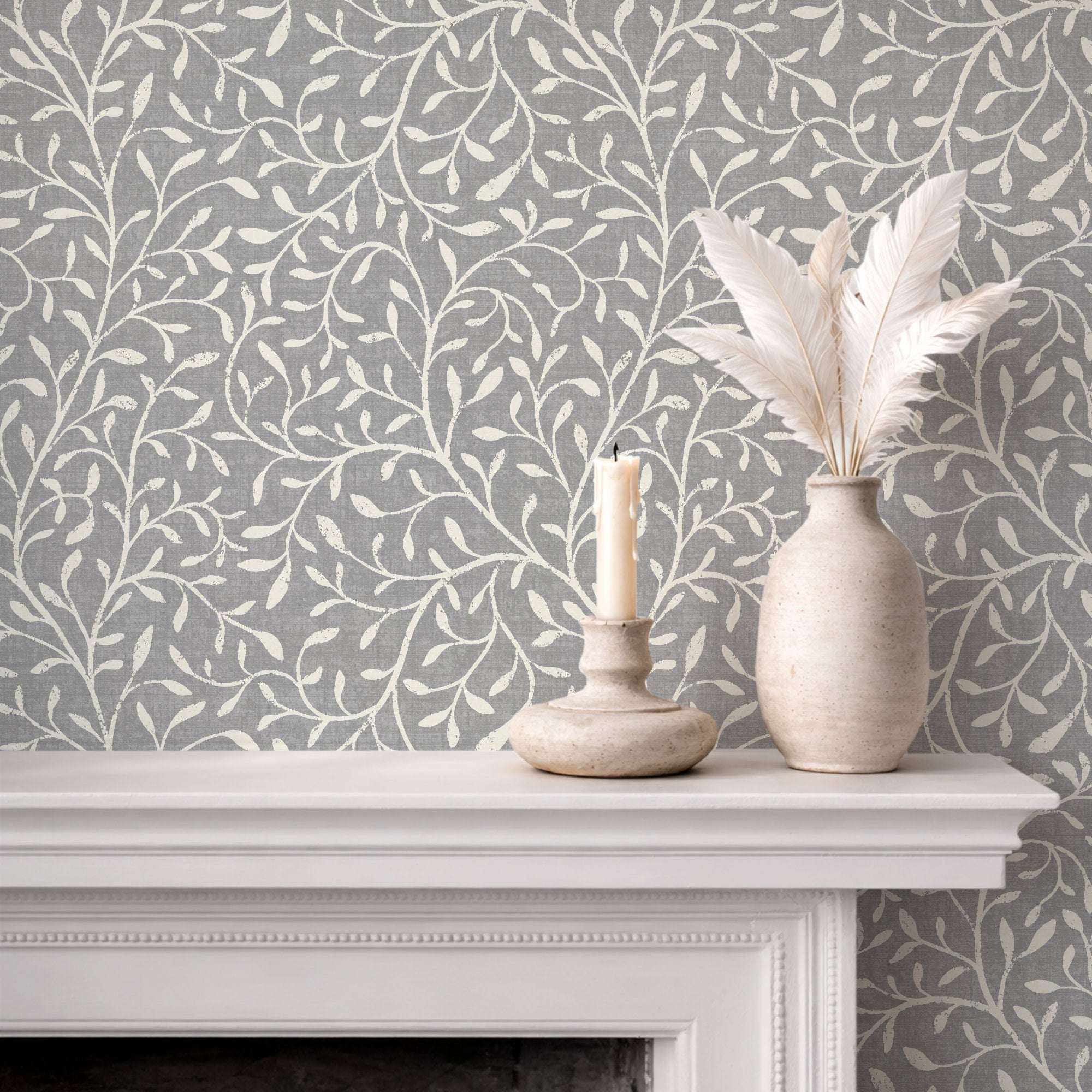 Botanical leaf silhouette wallpaper with white vine pattern on cool gray background