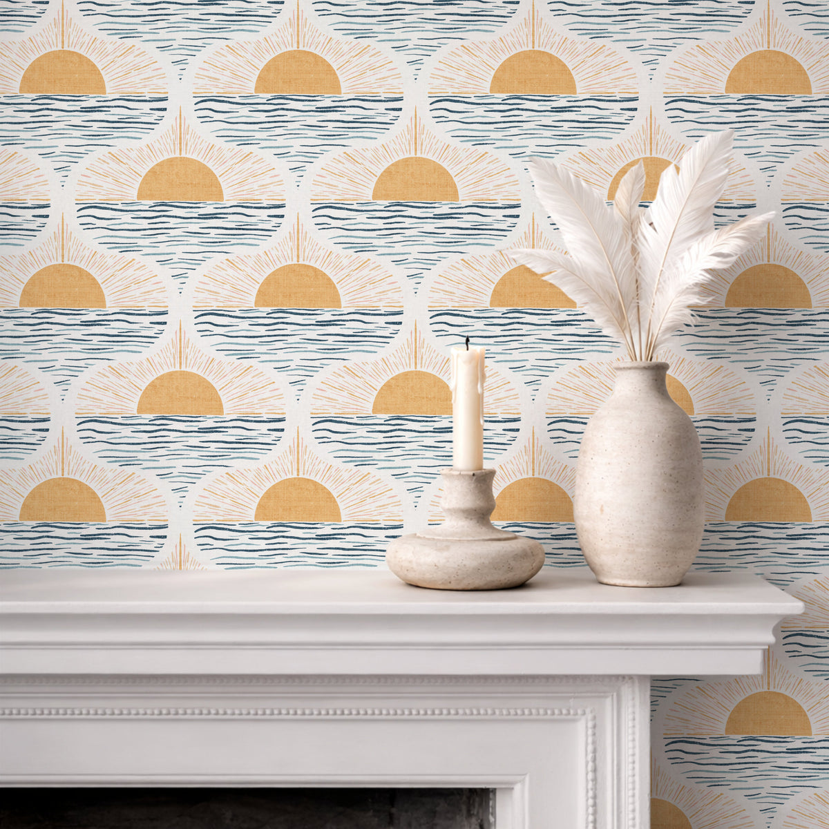 Decorative wall with a geometric boho coastal wallpaper, white vase, and candle on a mantelpiece.