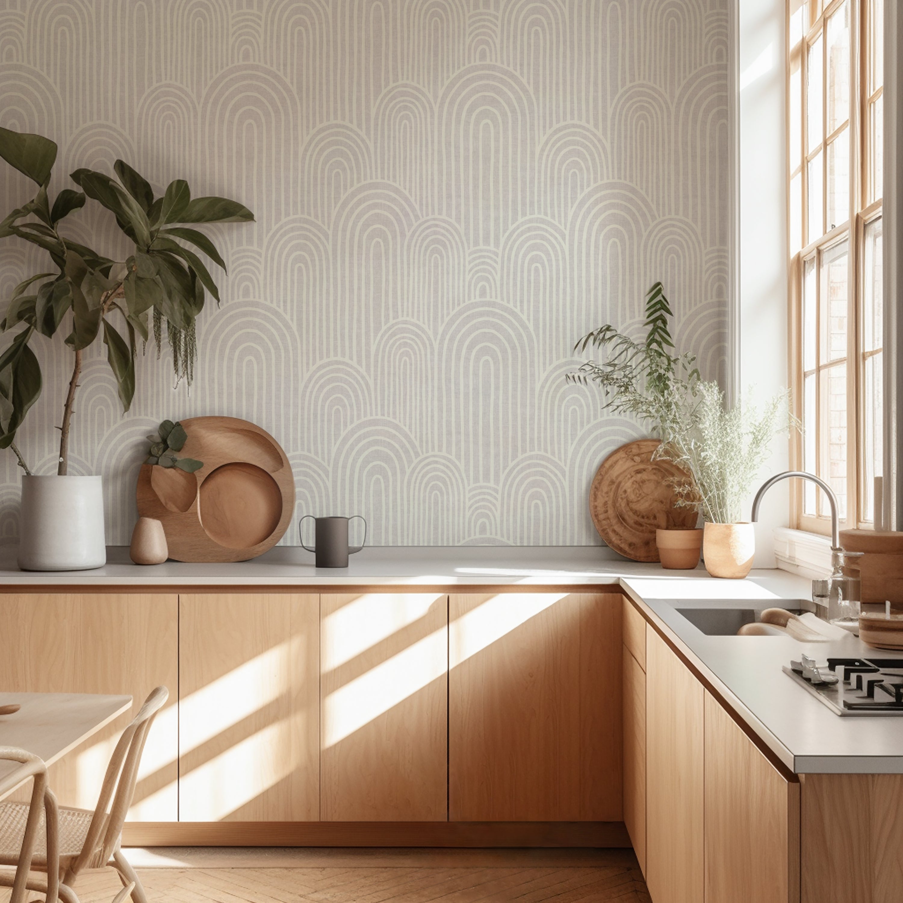 neutral Scandinavian arches wallpaper in a Scandinavian style kitchen with natural wood cabinets and plants