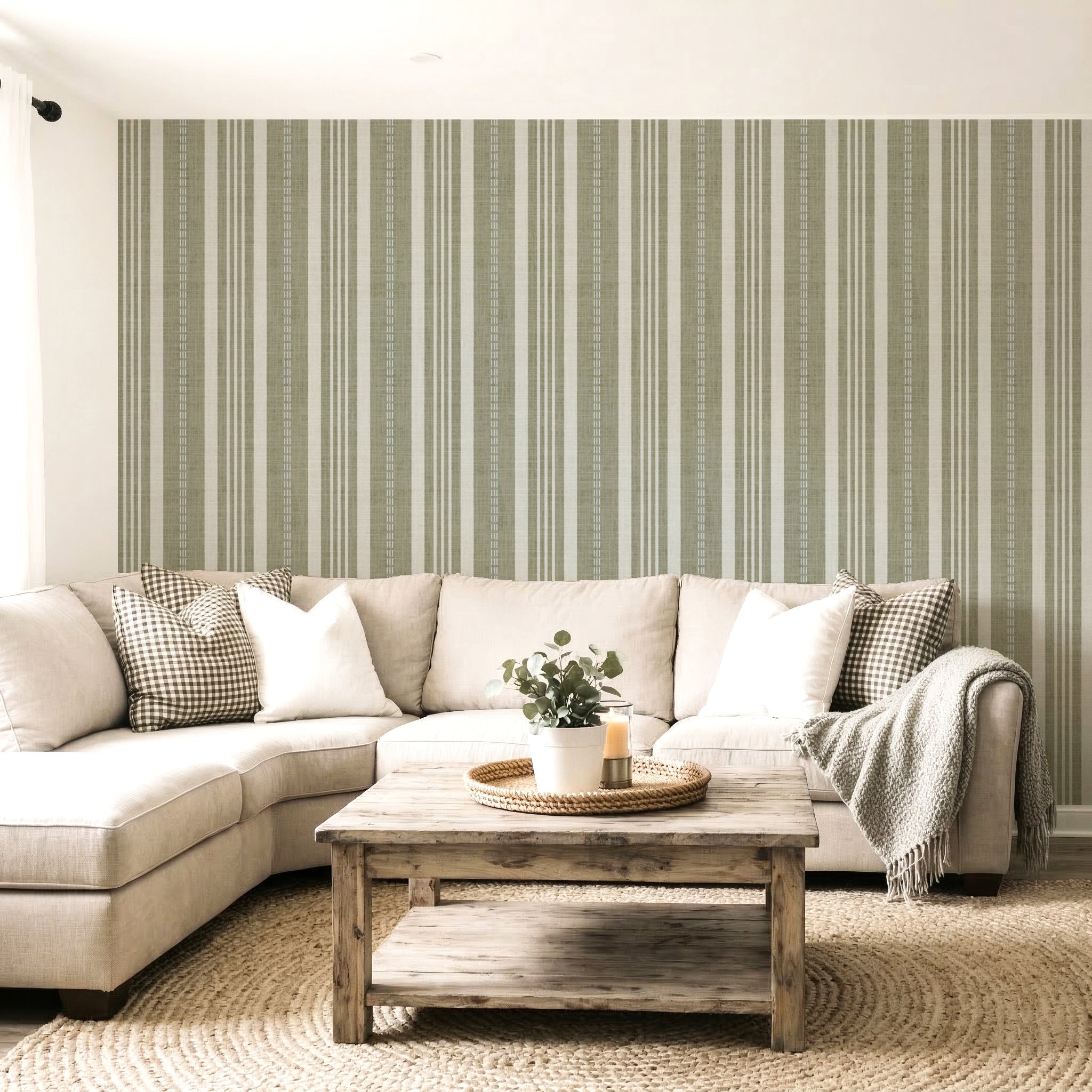 Living room featuring sage green ticking stripe wallpaper with classic vertical stripes and a cozy sofa set.