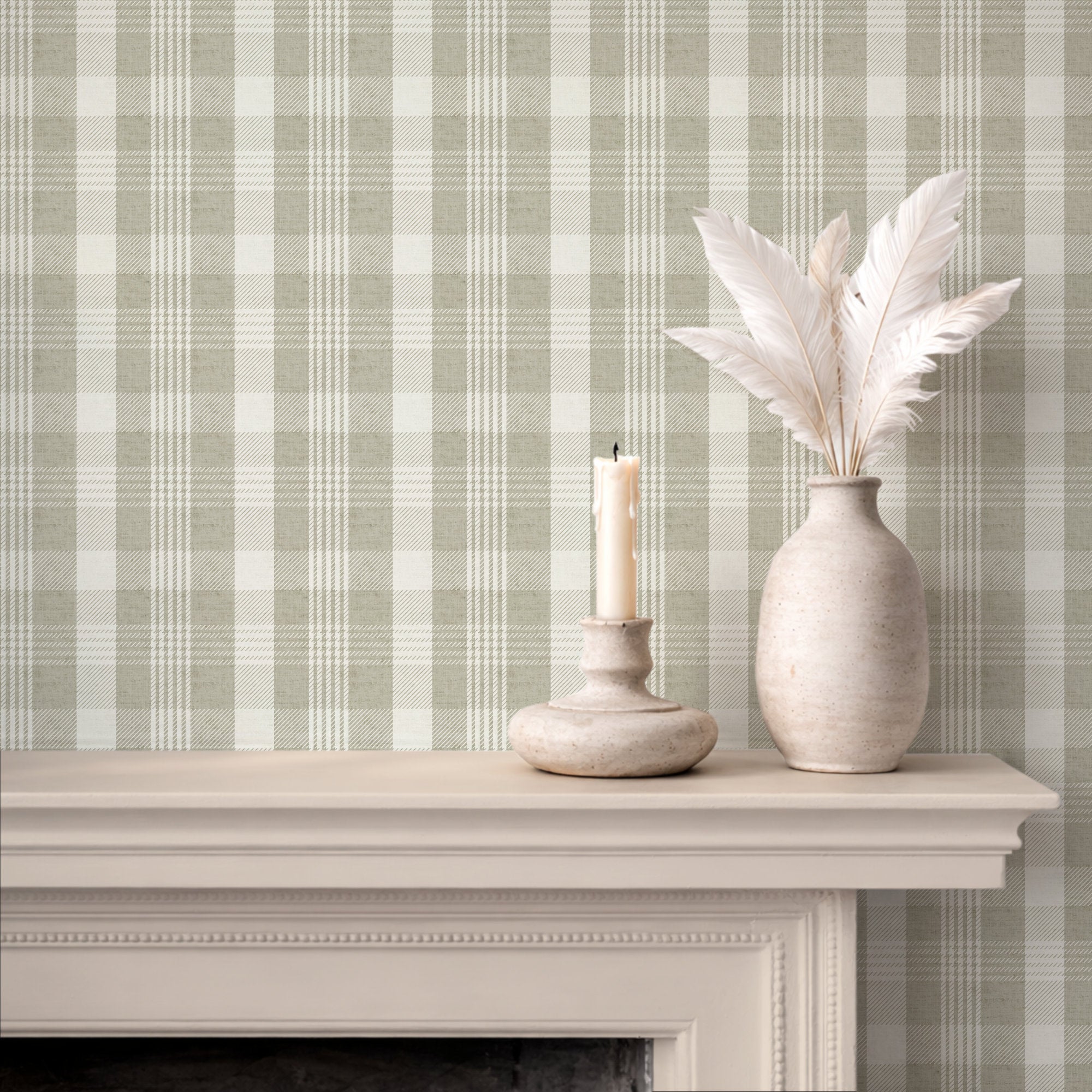 Sage green plaid wallpaper styled with candle and dried grasses