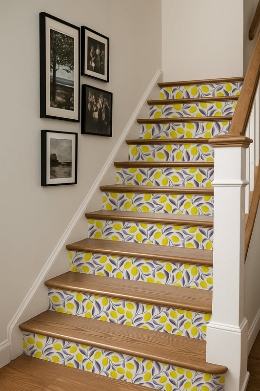Wooden staircase with patterned wallpaper on the stair risers, featuring a bold yellow and purple leaf design, creating a colourful and modern accent.