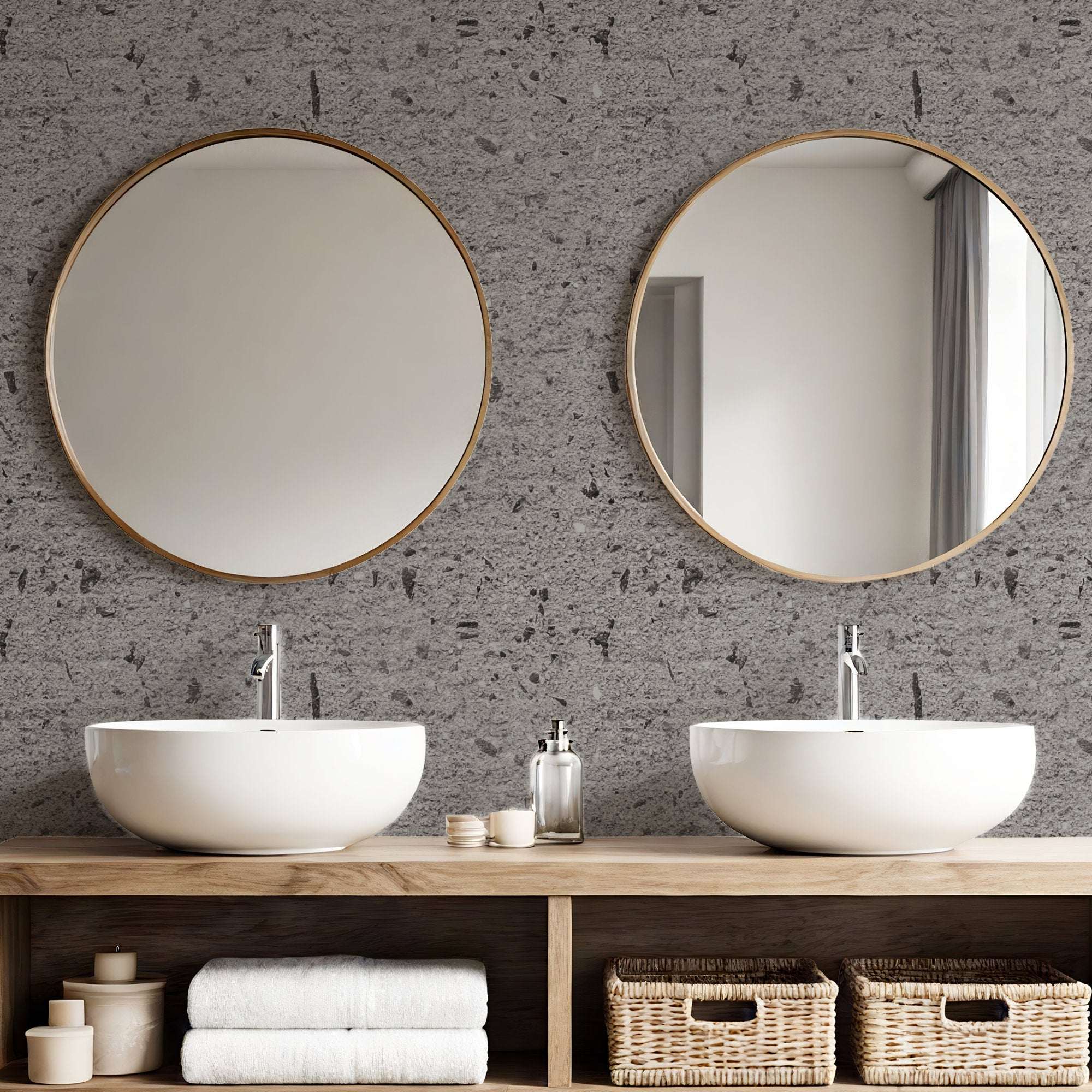 Dark grey concrete effect wallpaper with speckled texture and stone-like pitted marks