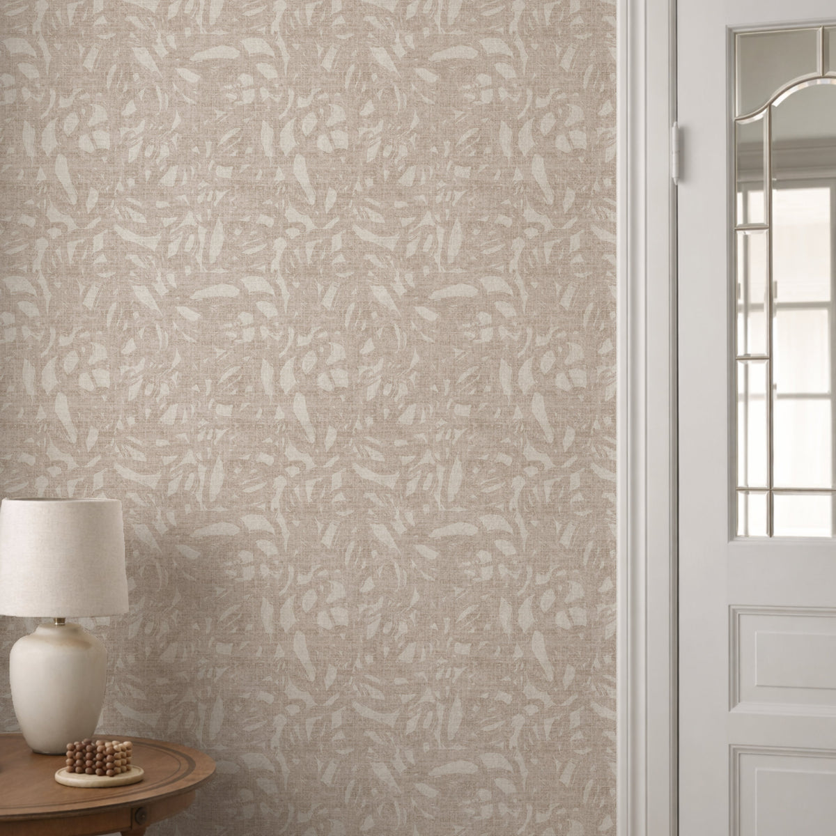 Brushstroke wallpaper roll in soft linen showing muted abstract painterly pattern