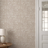 Brushstroke wallpaper roll in soft linen showing muted abstract painterly pattern