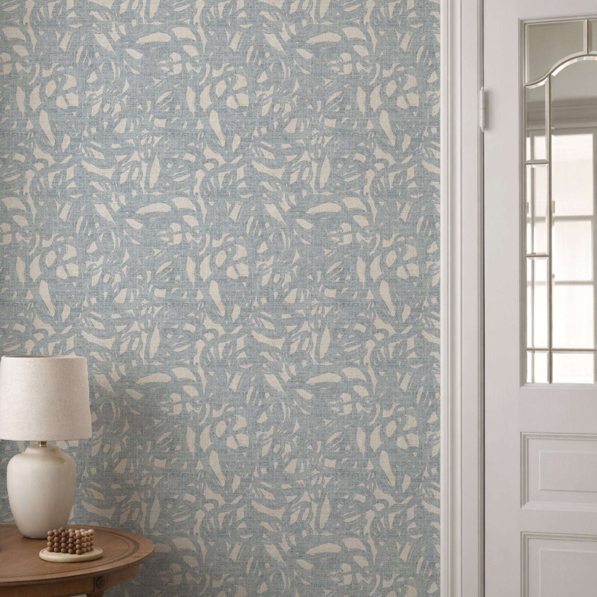 Blue abstract brushstroke wallpaper with pale irregular strokes, all-over pattern