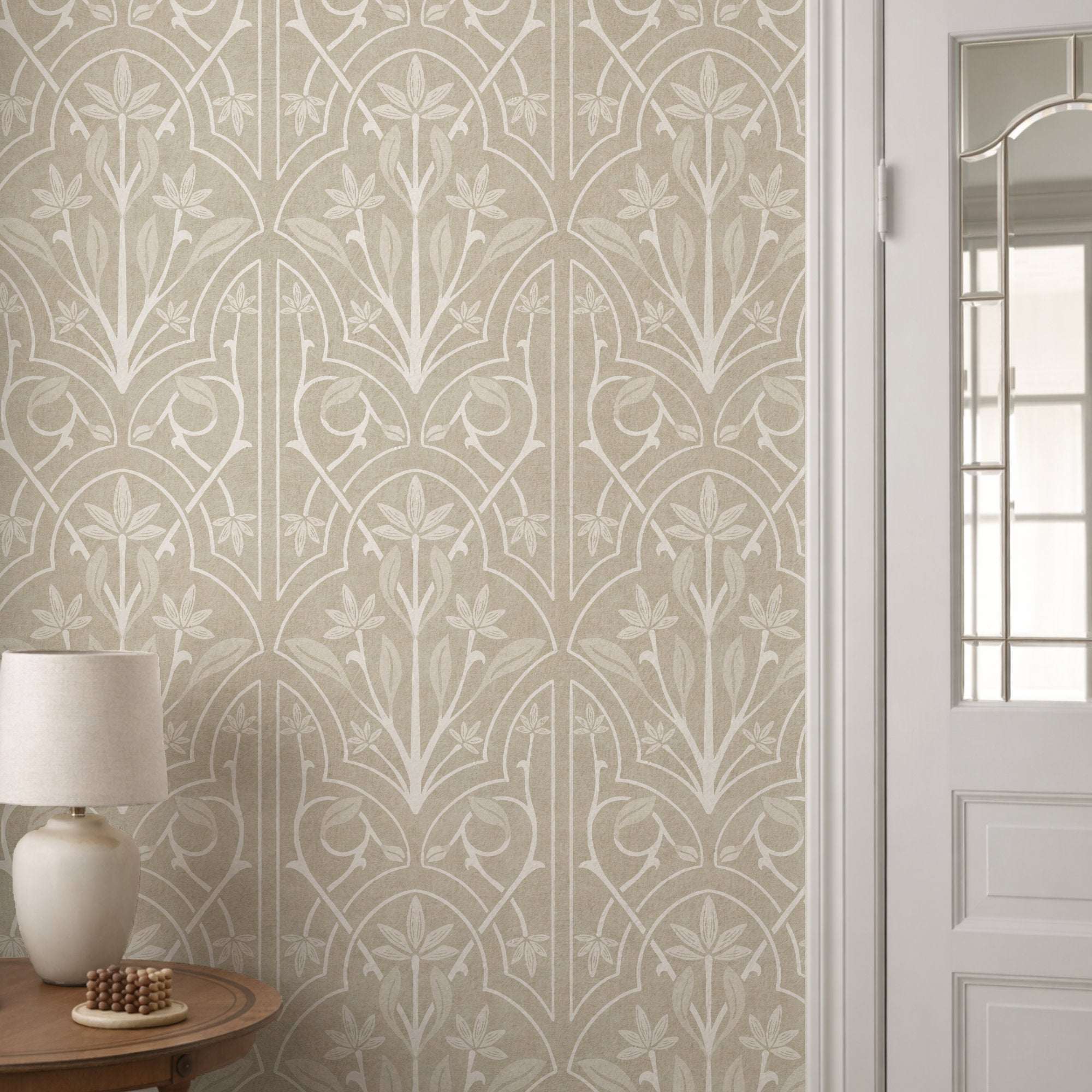Beige floral trellis wallpaper with repeating art nouveau leaf fans and vine motifs