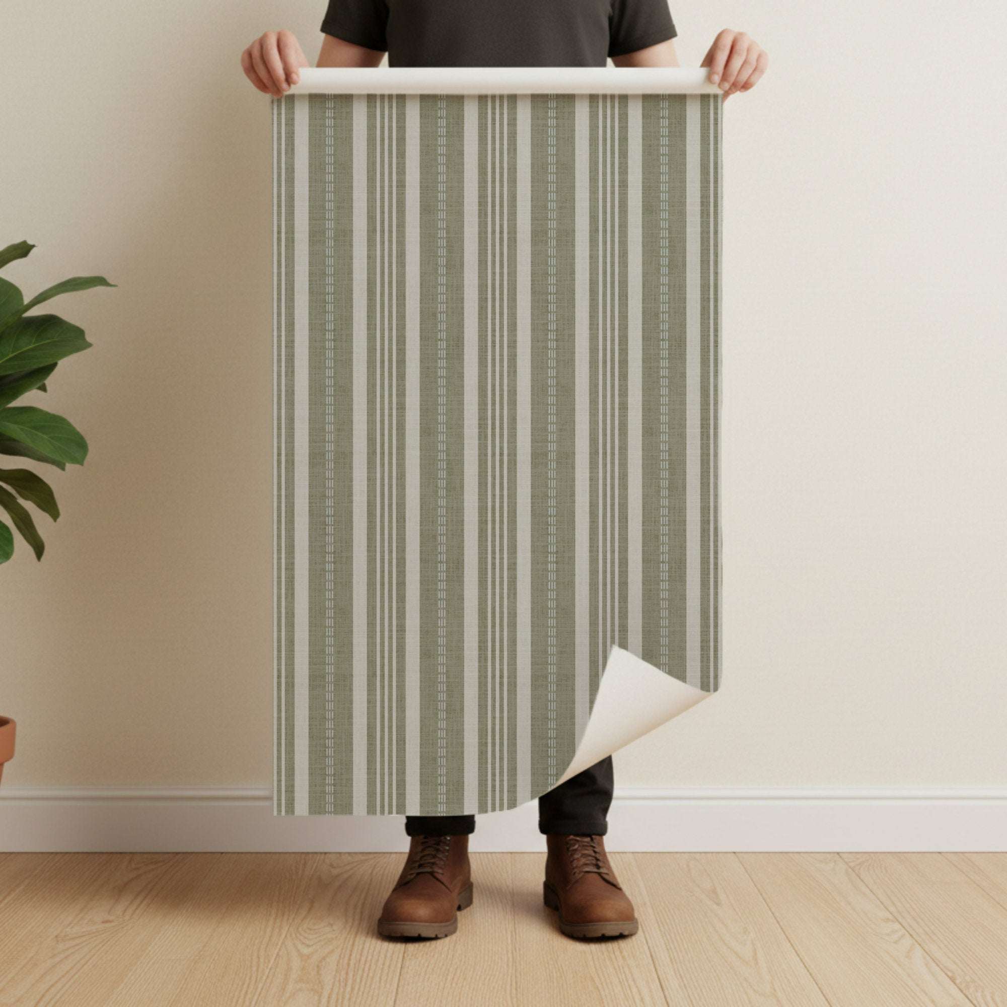 Self-hung wallpaper sheet with vertical ticking stripes in sage green and cream