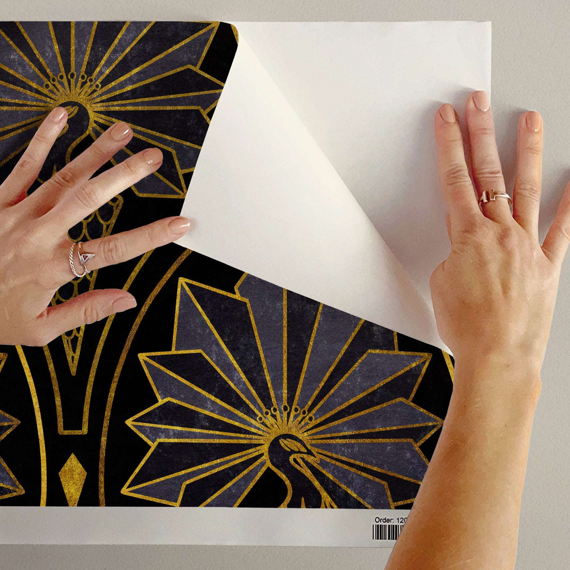 Peacock feather art deco wallpaper sample with gold fan pattern and dark blue print