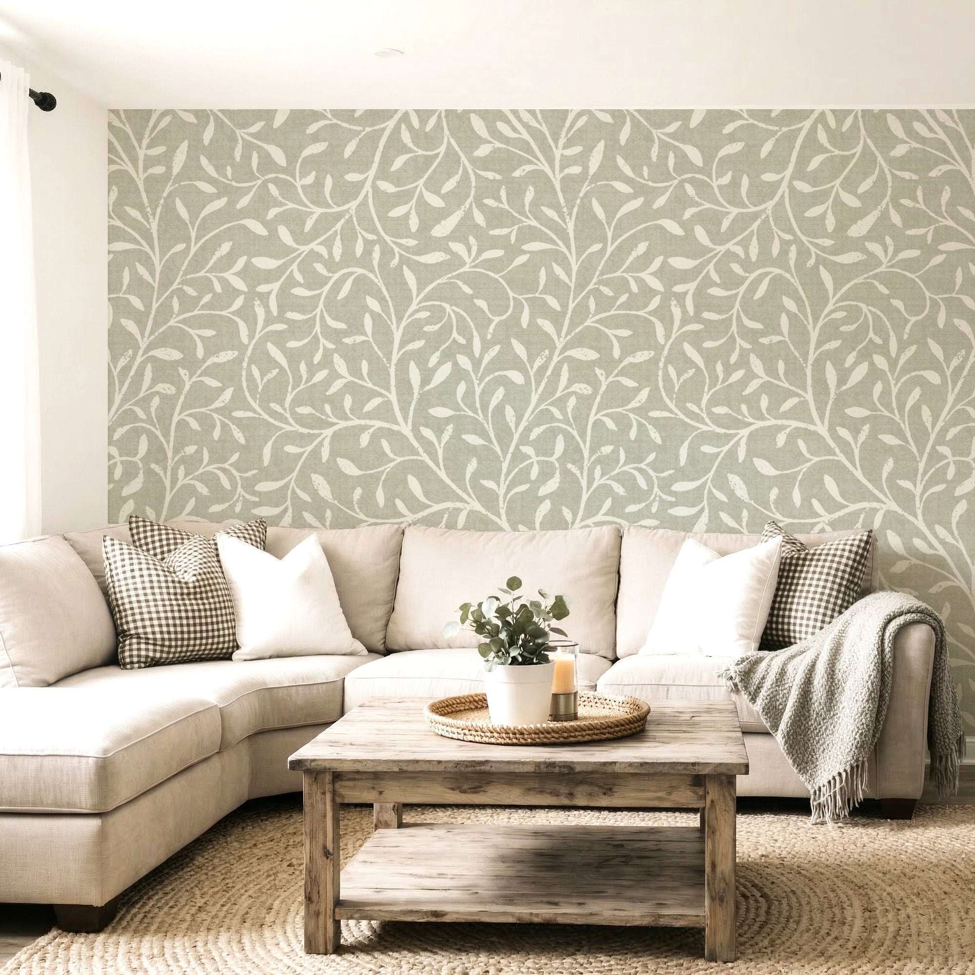 Botanical leaf silhouette wallpaper on wall with white vine pattern over light gray-beige