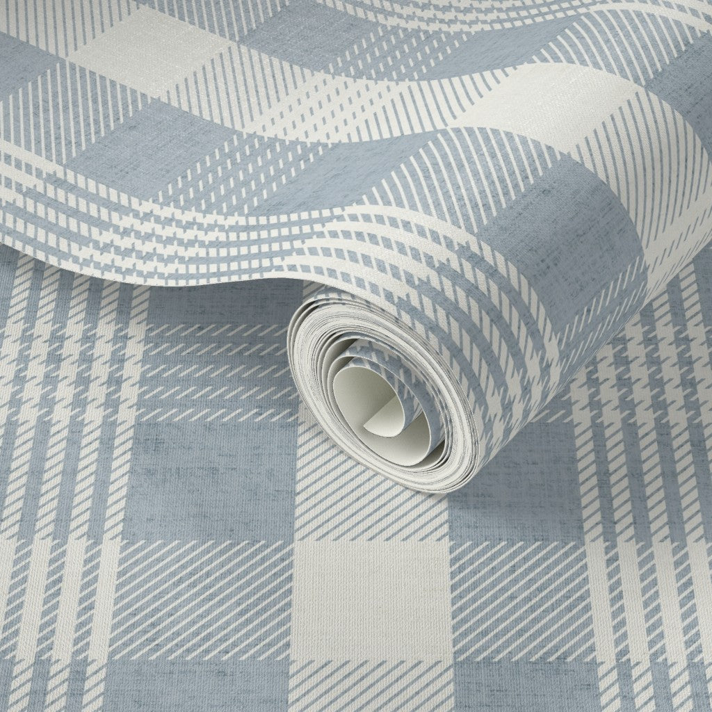 Blue plaid wallpaper roll with a modern checkered pattern, showing fabric-like texture detail for stylish wall coverings