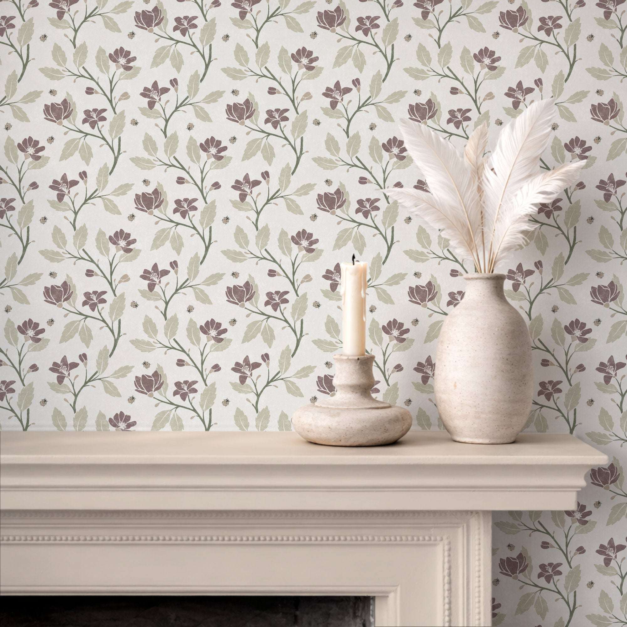 Floral vine wallpaper with soft pink flowers and green leaves, plus small ladybirds pattern