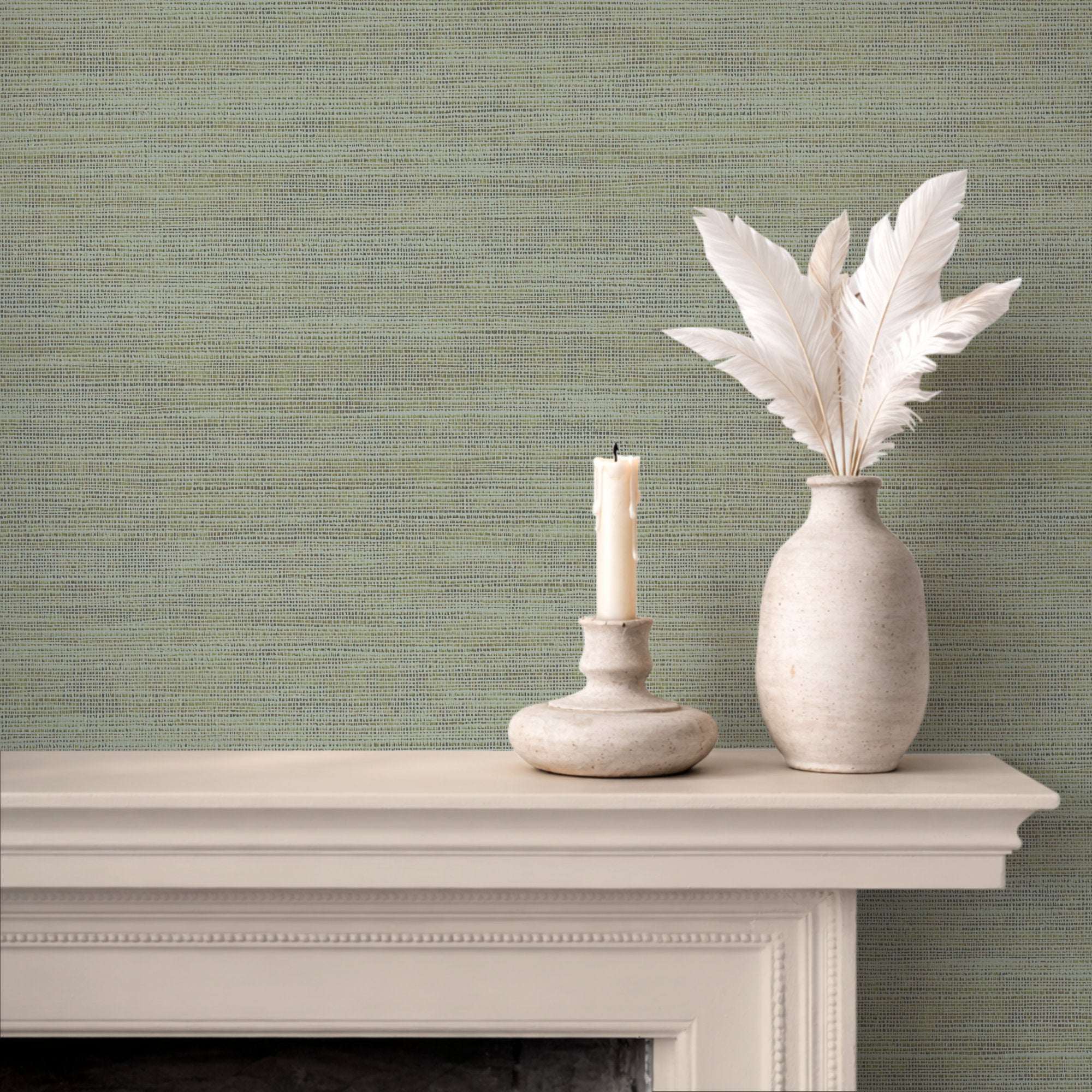 Faux grasscloth wallpaper, light green woven texture, solid color finish on wall