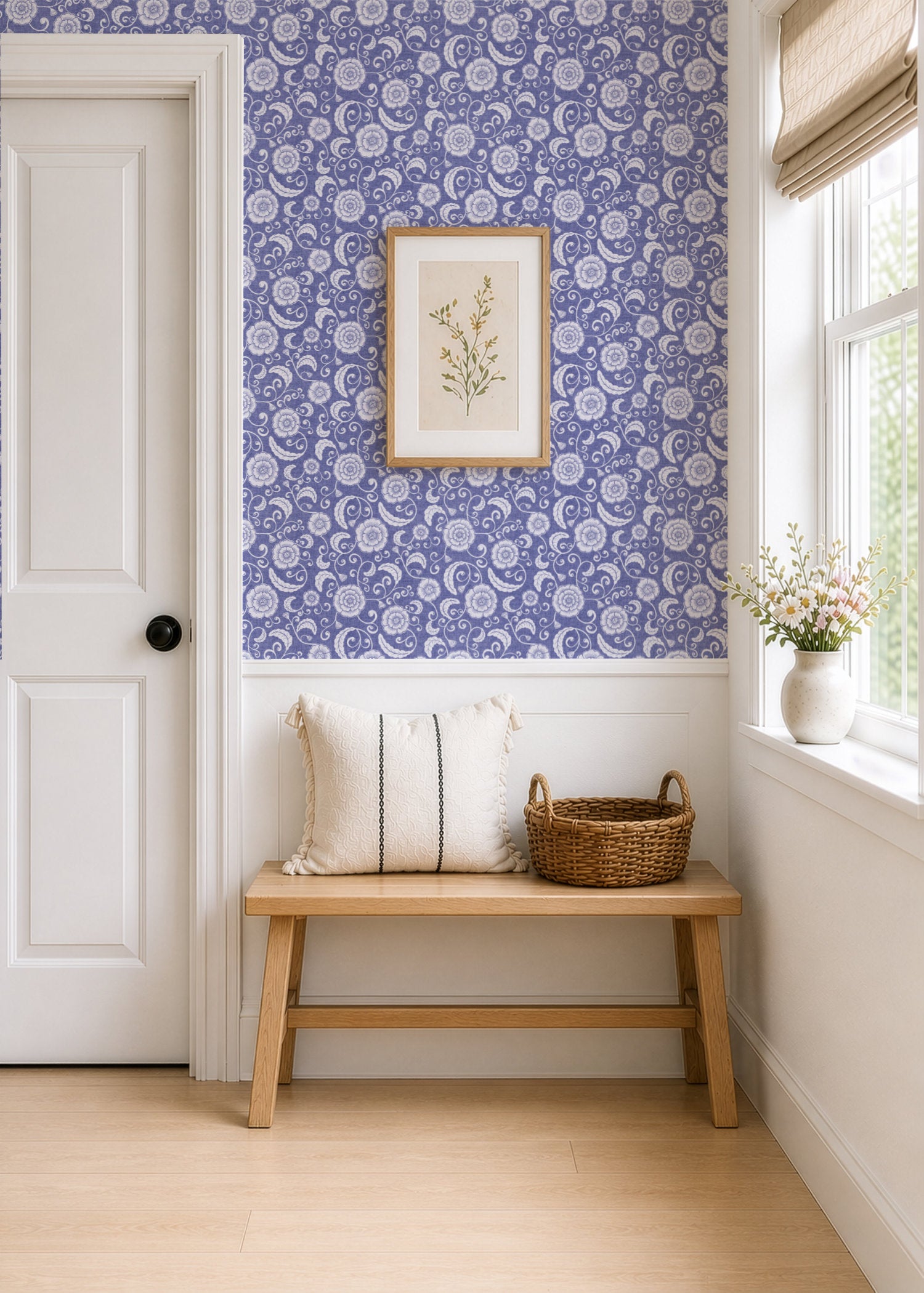 Blue ginger jar wallpaper in a hallway with a bench and framed print