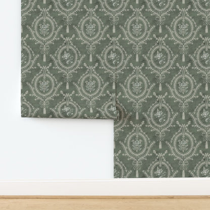 Green Damask Wallpaper Installation – heritage neoclassical medallion wallpaper styled against a white wall for modern contrast.