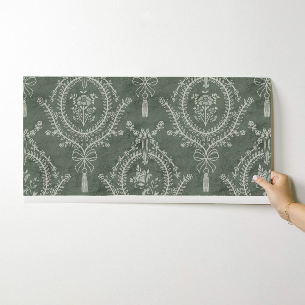 Green Damask Wallpaper Sample – neoclassical floral medallion design shown on wallpaper roll for scale.