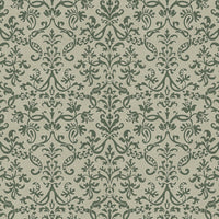 Close-up of silhouette green Victorian damask wallpaper highlighting ornate floral details.