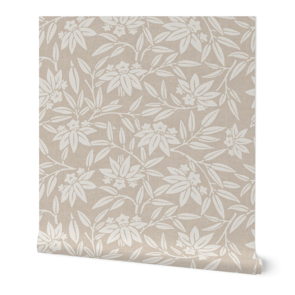 Close-up of a neutral Japandi botanical wallpaper sample with a soft linen texture and hand-drawn lotus flowers