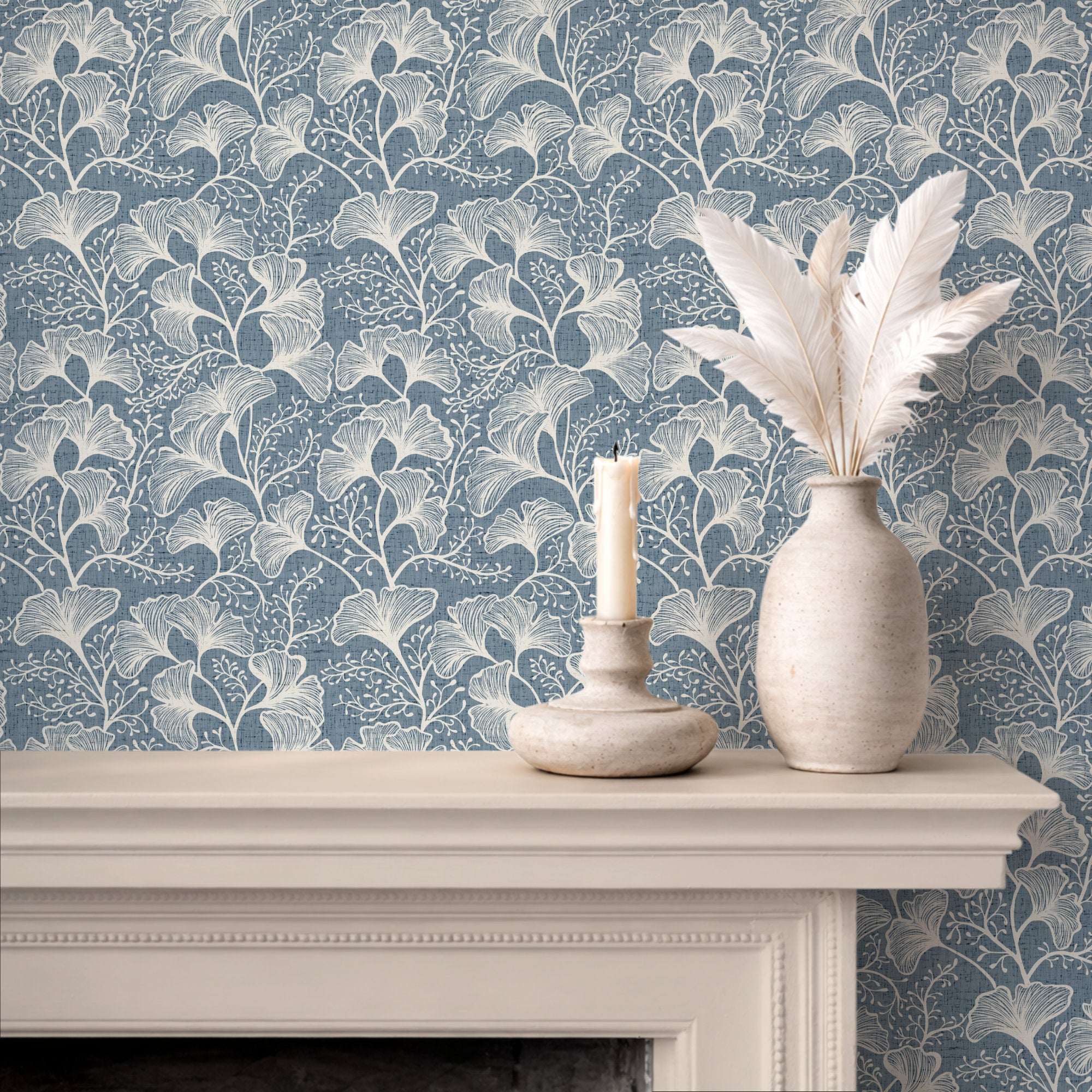 Blue ginkgo leaf wallpaper with light-colored botanical repeat pattern.