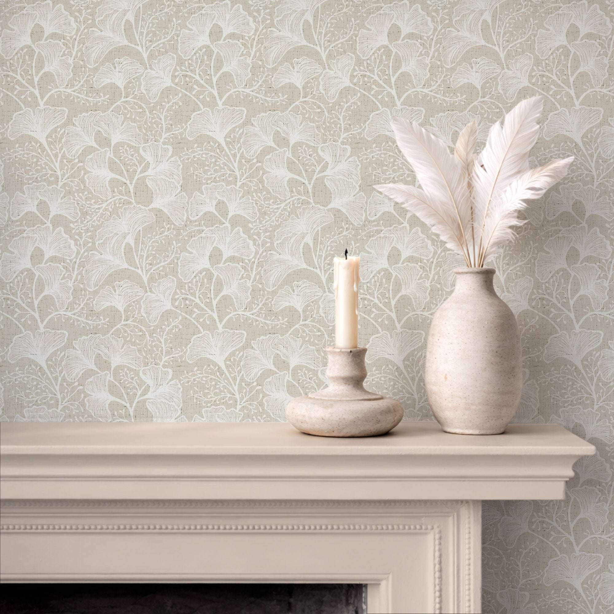 Pale beige ginkgo leaf wallpaper with white botanical repeat pattern.