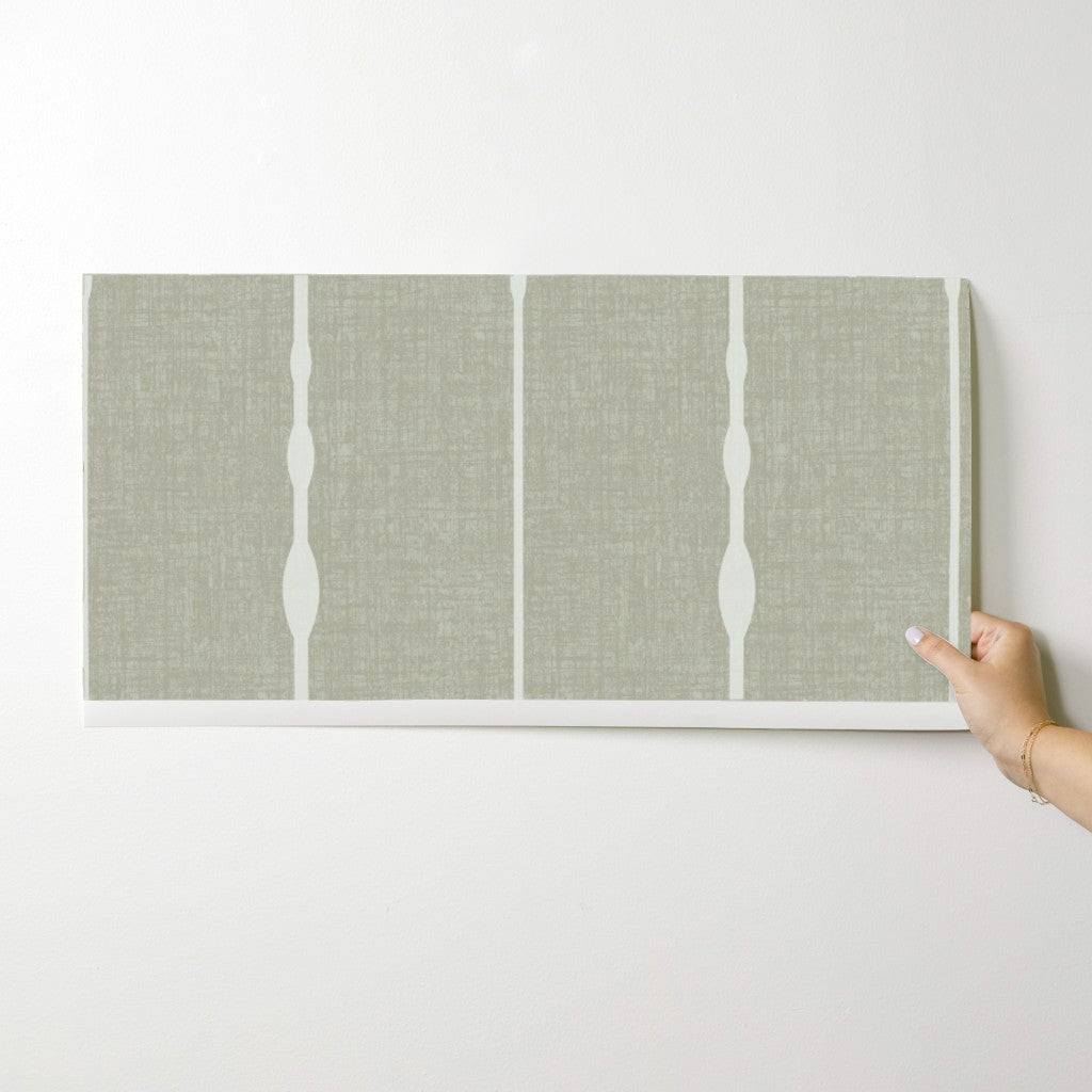 Light green vertical striped wallpaper swatch – modern geometric wallpaper design