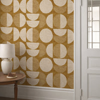 Mustard yellow mid-century modern circle wallpaper in hallway with white panelling