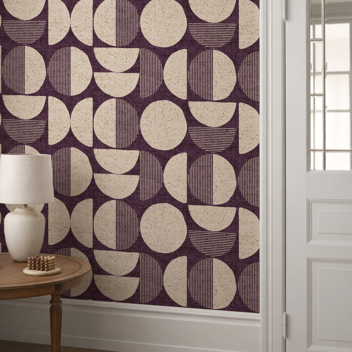 Plum mid-century modern circle wallpaper in hallway with white panelling