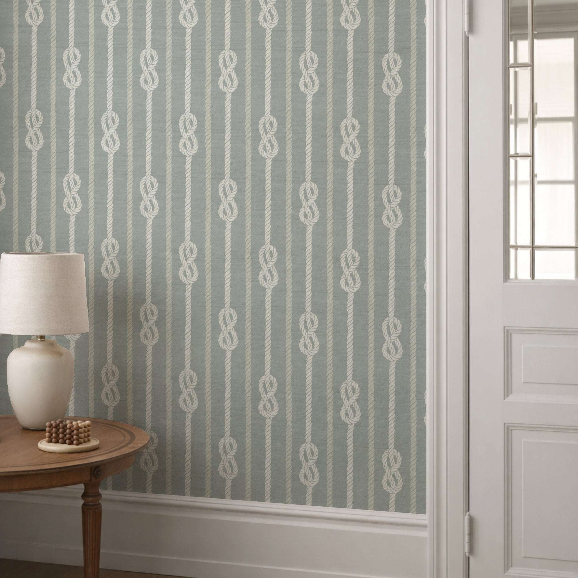 Nautical knot rope stripe wallpaper on light blue with white knot motifs
