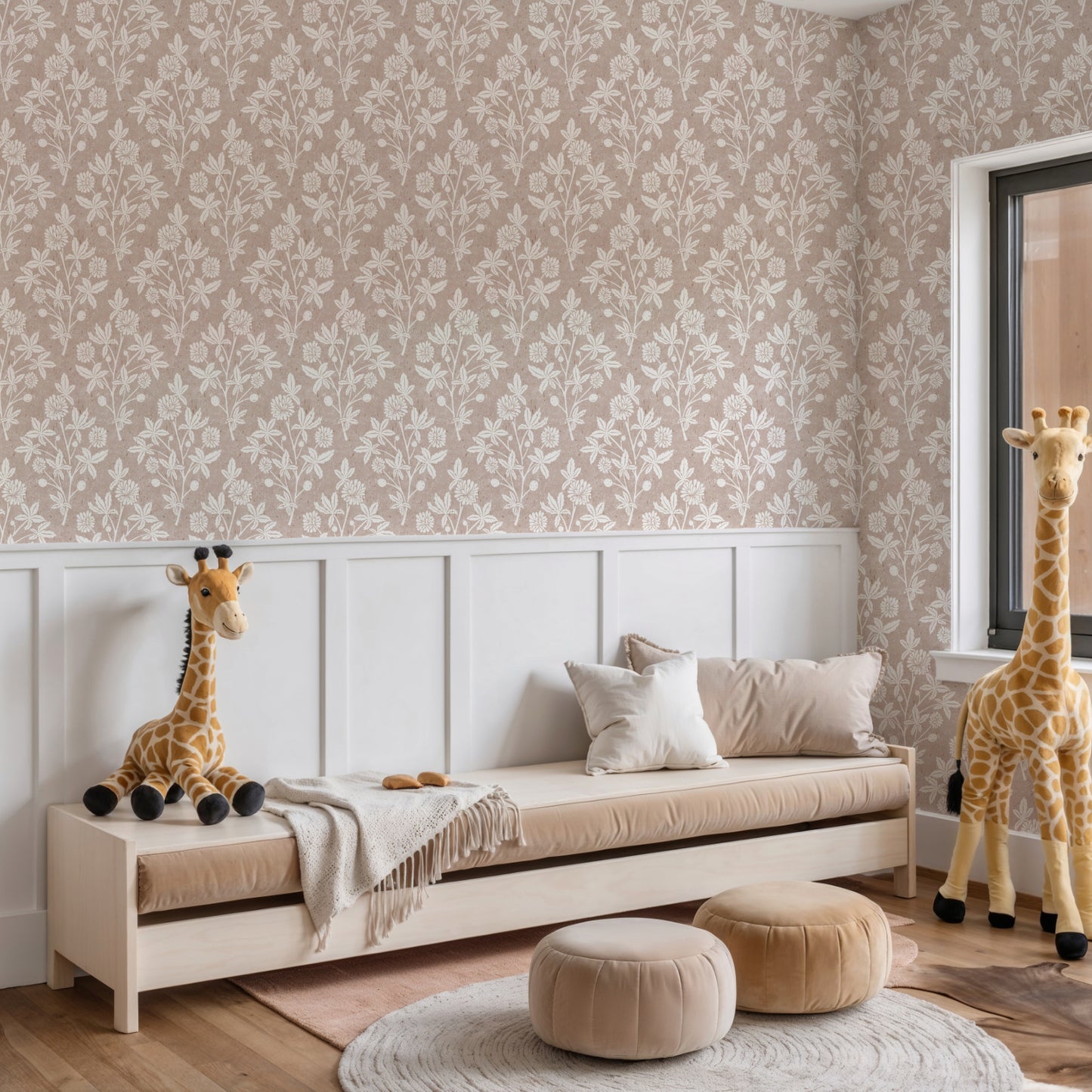 Pink bedroom with giraffe lamp and modern décor, showing block print wallpaper with floral and geometric diamond motifs.