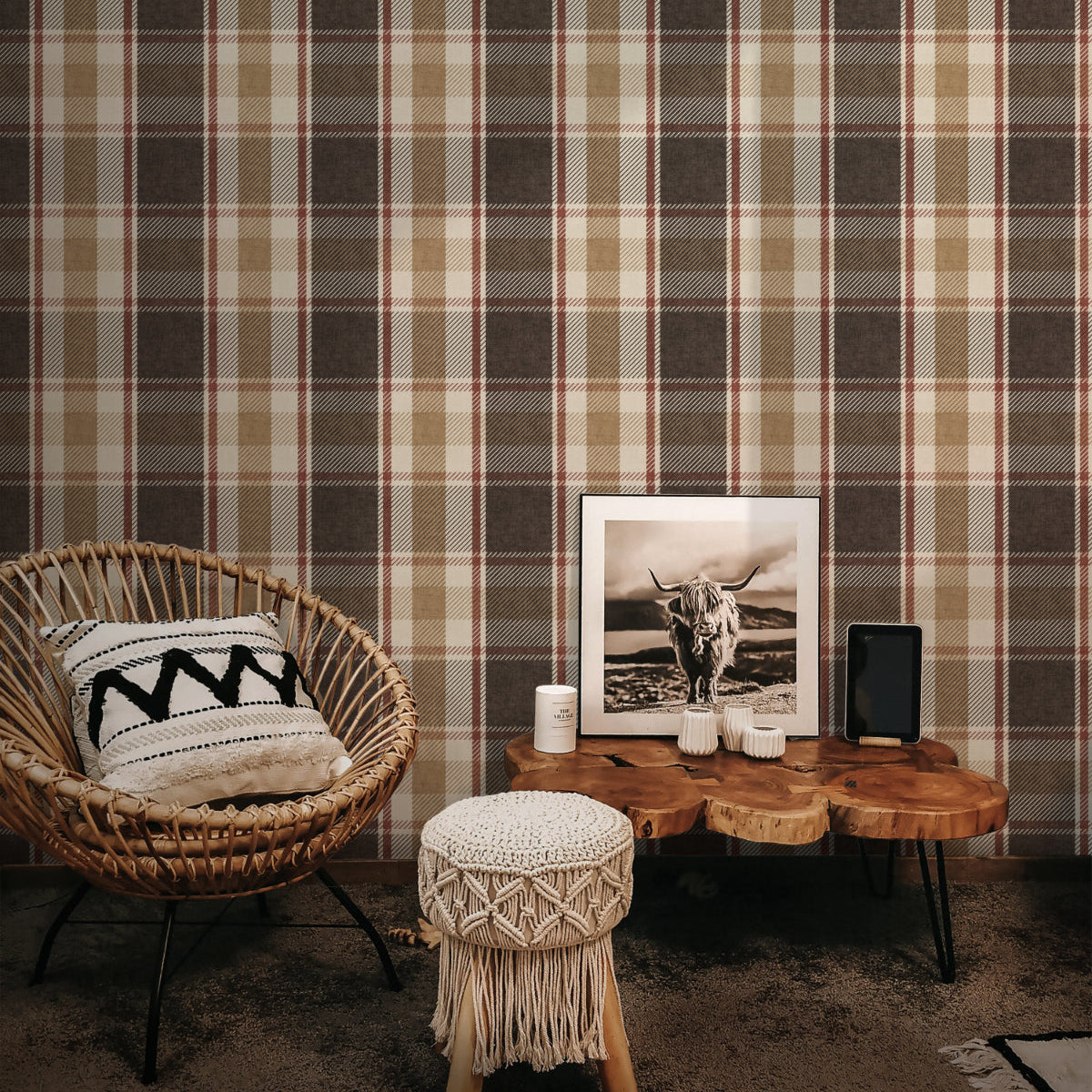 Cosy living room with rustic plaid wallpaper in brown and tan, styled with natural wood furniture and woven textures.