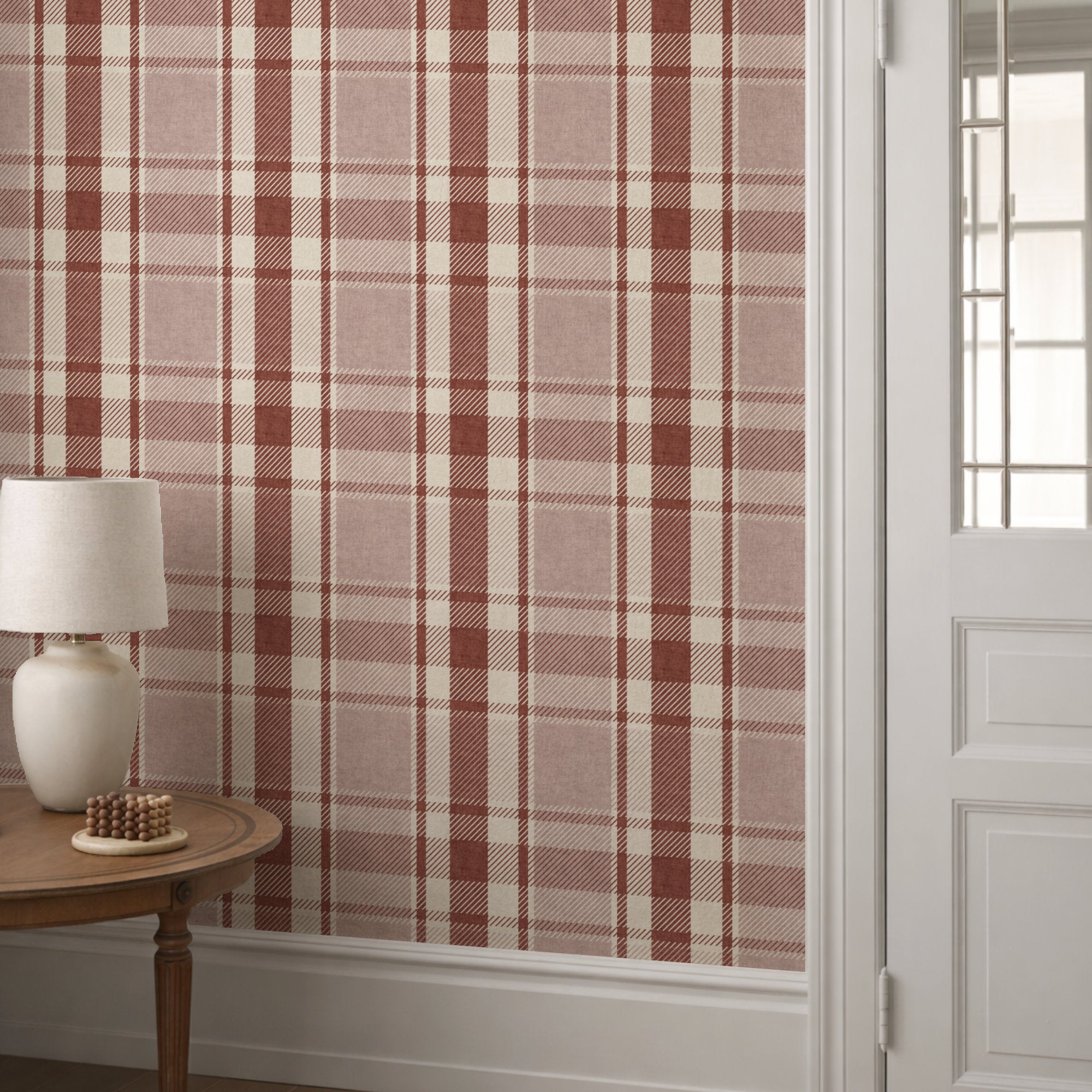 Tartan plaid wallpaper with muted rose, tan, and cream blocks and thin dark grid lines