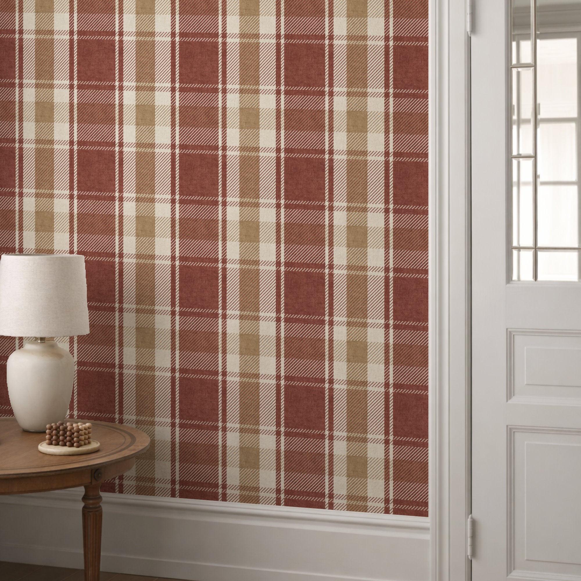 Tartan plaid wallpaper with muted red-brown stripes, tan blocks, and dark grid lines