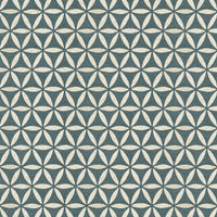Geometric wallpaper close up pattern detail in teal blue and cream showing interlocking circles