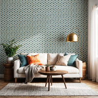 Sacred geometric wallpaper in teal blue in living room with white sofa and gold floor lamp