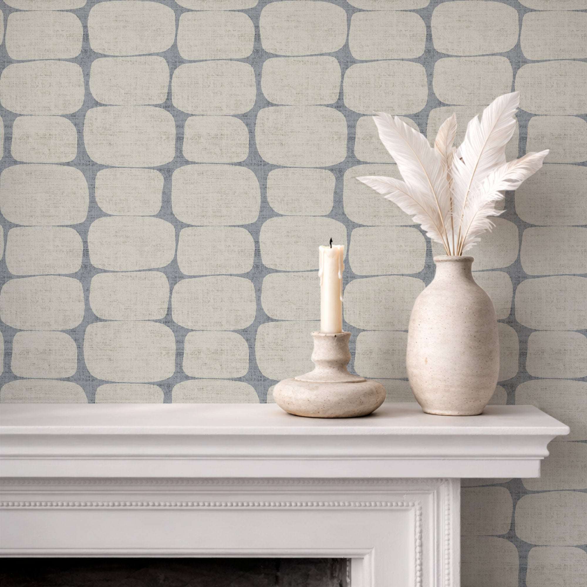 Wallpaper with blue-gray geometric pebble stripe pattern of rounded rectangles.
